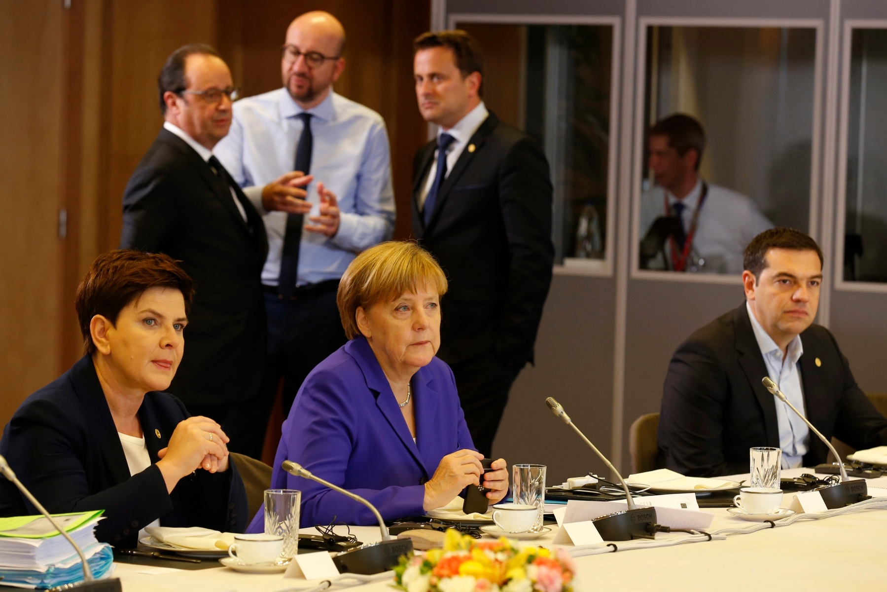 epa05397271 (L-R, front) Polish Prime Minister Beata Szydlo, German Chancellor Angela Merkel and Greek Prime Minister Alexis Tsipras at the start of the second day of the European Council meeting in Brussels, Belgium, 29 June 2016. EU leaders met on 28 June for the first time since the British referendum, in which 51.9 percent voted to leave the European Union.  EPA/PASCAL ROSSIGNOL / POOL BELGIUM EUROPEAN COUNCIL MEETING BRITAIN BREXIT