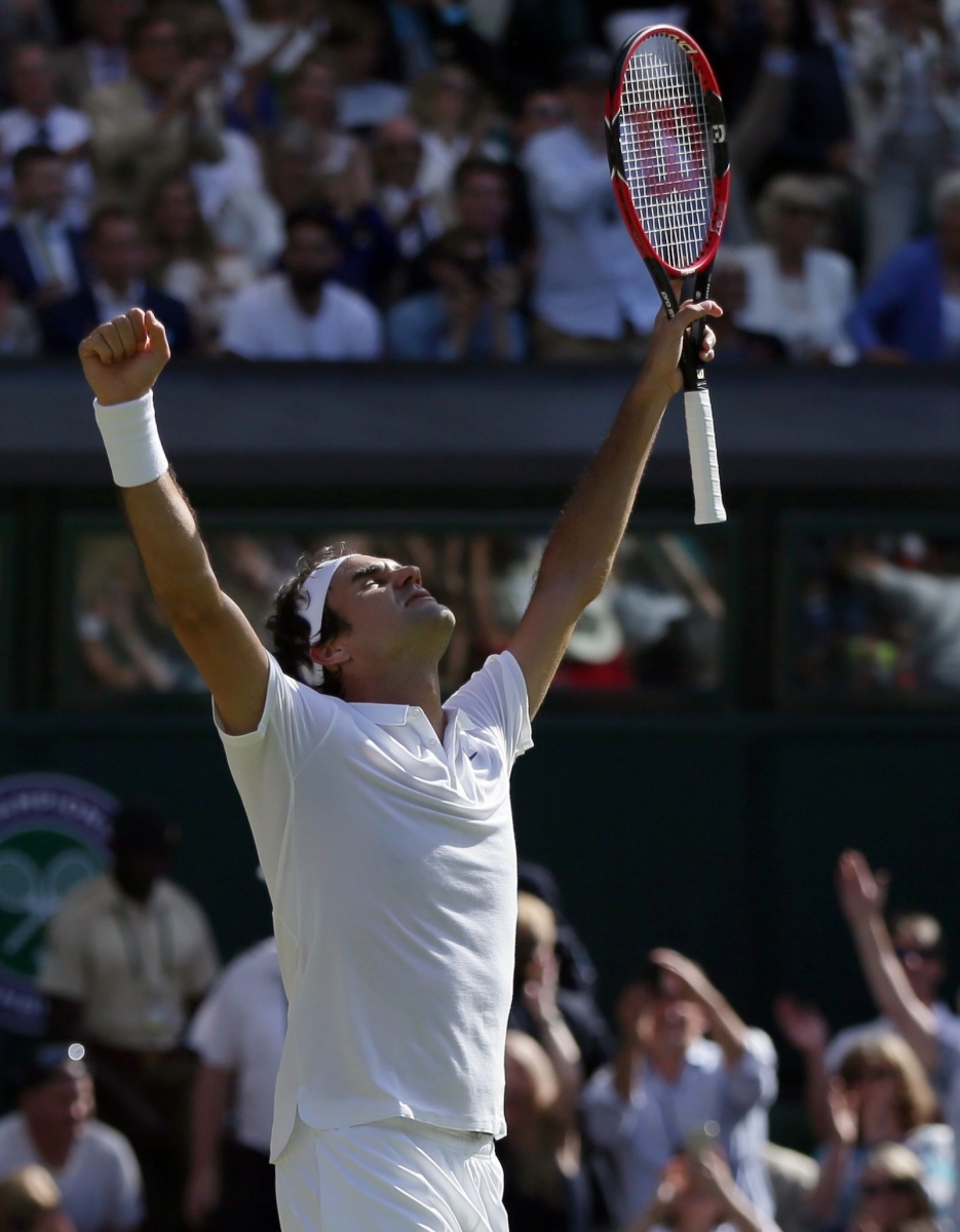 Roger Federer of Switzerland celebrates at match point after beating Marin Cilic of Croatia in their men's singles match on day ten of the Wimbledon Tennis Championships in London, Wednesday, July 6, 2016. (AP Photo/Tim Ireland) Britain Wimbledon Tennis
