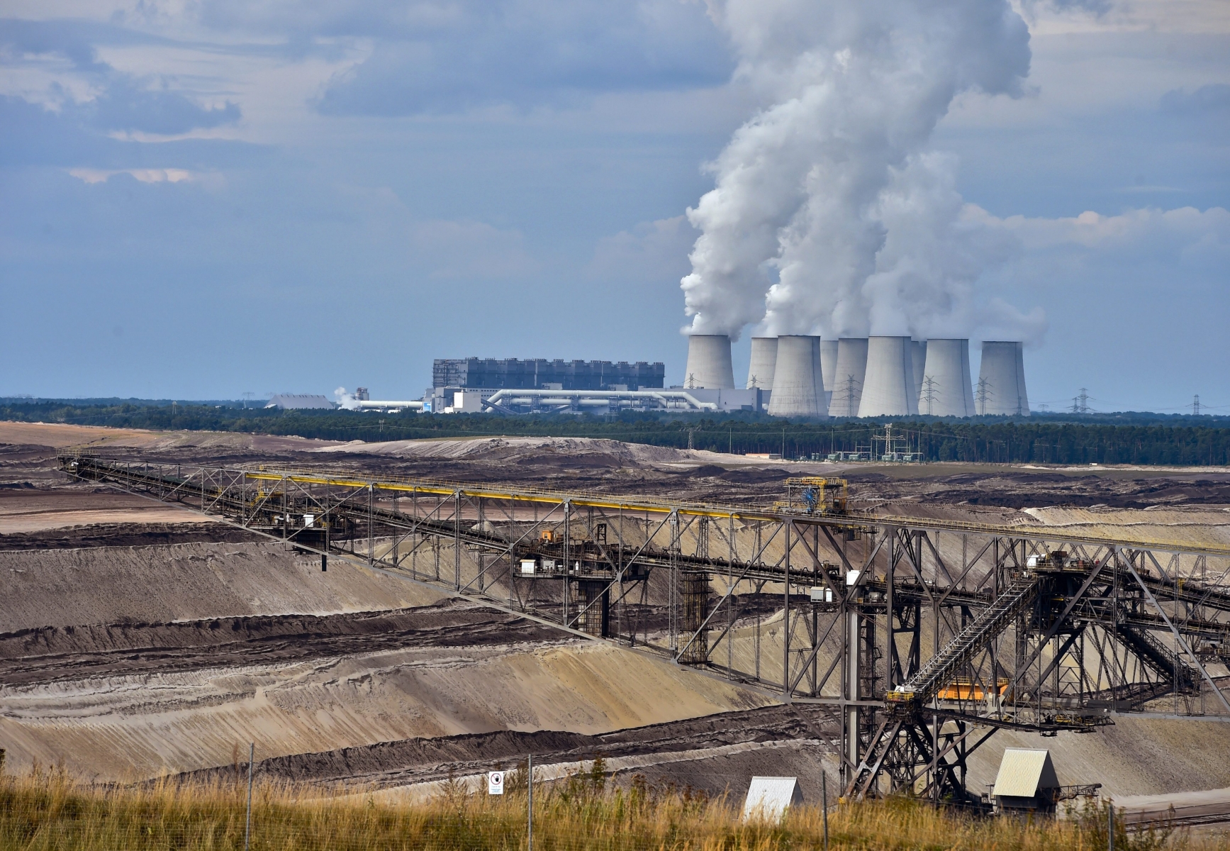 epa05073768 (FILE) A file photo dated 23 August 2014 showing a general view of the open lignite pit 'Jaenschwalde' in Griessen, Brandenburg state, Germany, of the Swedish power company Vattenfall.  Demand for coal has stalled after more than a decade of consistent growth, the International Energy Agency said 18 December 2015, attributing much of the slowdown to declining demand in China. In its annual coal report, the Paris-based agency said it had cut its five-year forecast for demand growth by 500 million tonnes of coal equivalent, which represents energy generated by burning a metric tonne of coal. Economic restructuring in China, which represents half of the world's coal consumption, and a new climate agreement brokered in Paris are largely responsible for the decline, the agency said.  EPA/PATRICK PLEUL FILE GERMANY ECONOMY COAL