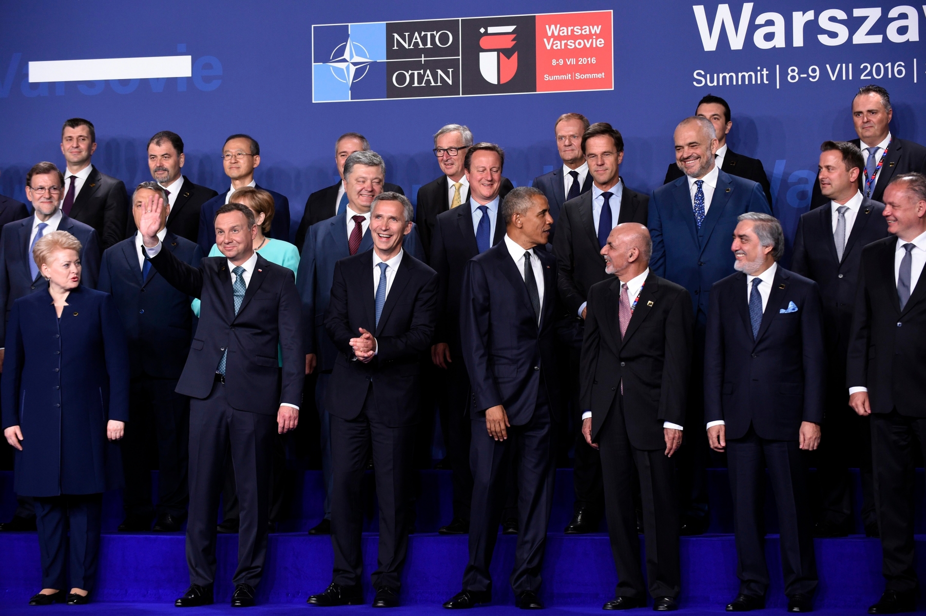 President Barack Obama, center, participates in a NATO family photo at PGE National Stadium in Warsaw, Poland, Friday, July 8, 2016. Obama is in Warsaw to attend the NATO Summit. Front row, from left are, Lithuanian President Dalia Grybauskaitė, Polish President Andrzej Duda, NATO Secretary General Jens Stoltenberg, Obama and Afghanistan's President Ashraf Ghani is right of Obama. Afghanistan's Chief Executive Dr. Abdullah Abdullah, second from right front. (AP Photo/Susan Walsh) Obama US Poland NATO