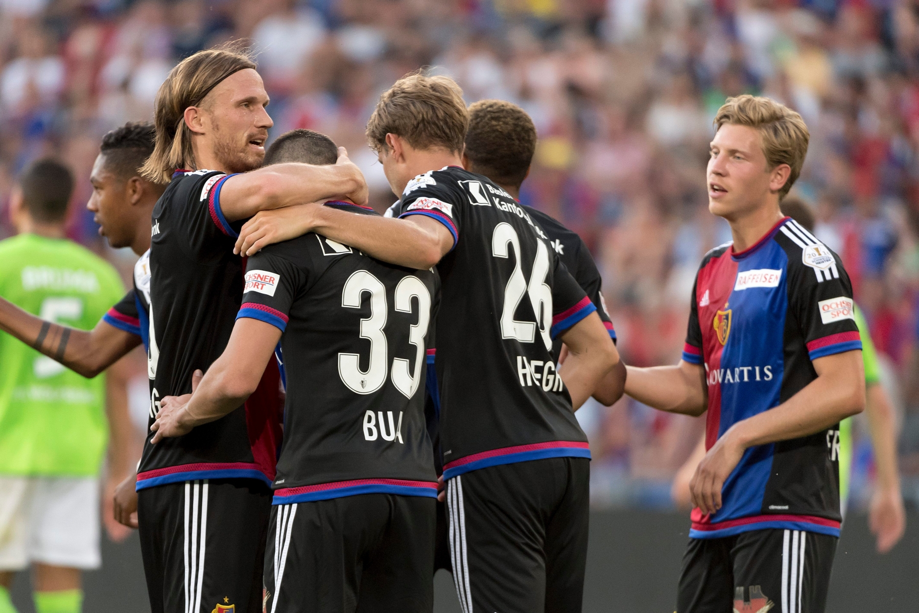 Basel's players cheer after scoring during a friendly soccer match between Switzerland's FC Basel 1893 and Germany's VfL Wolfsburg at the St. Jakob-Park stadium in Basel, Switzerland, on Tuesday, July 19, 2016. (KEYSTONE/Georgios Kefalas)  SOCCER BASEL WOLFSBURG