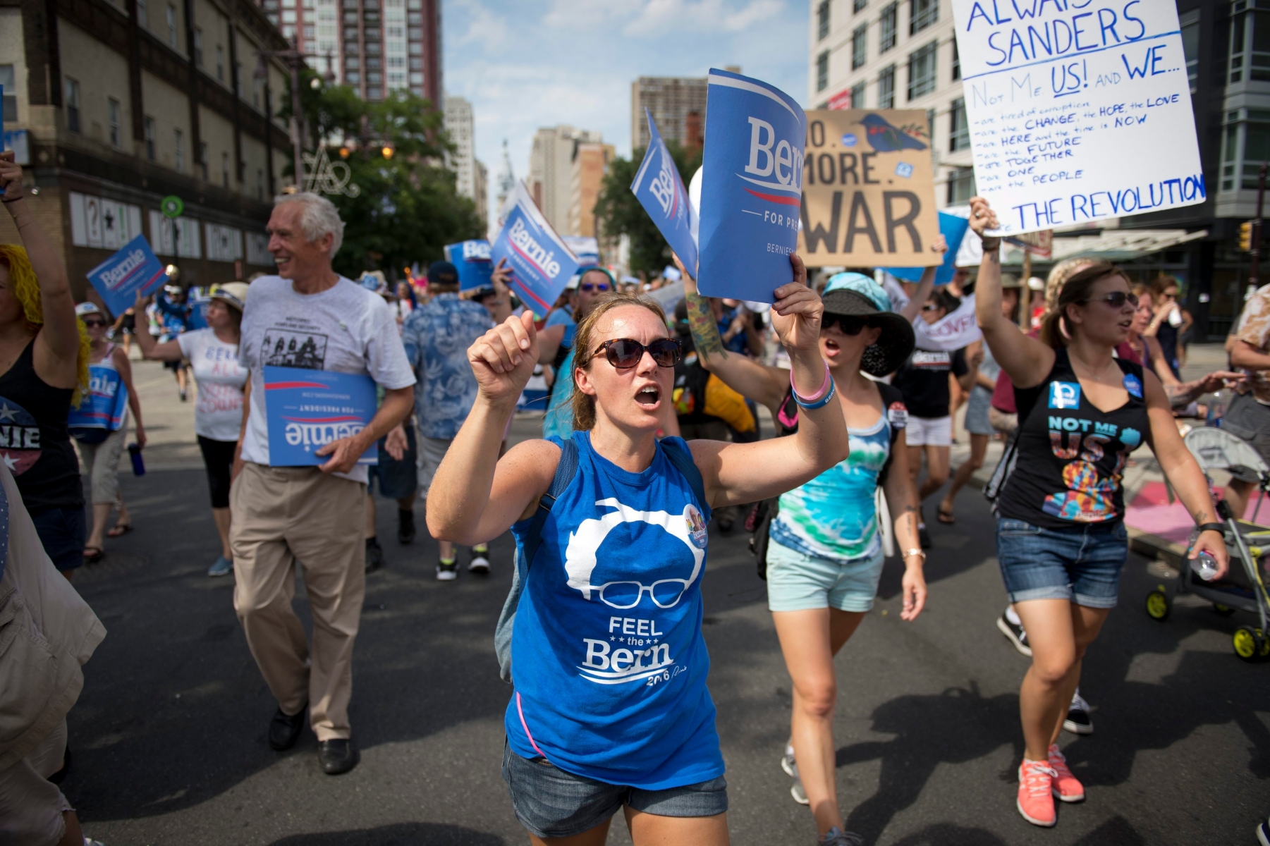 epa05439614 Protesters march in support of Bernie Sanders near the 2016 Democratic National Convention, held at the Wells Fargo Center in Philadelphia, Pennsylvania, USA, 24 July 2016. The Democratic Convention will open on 25 July 2016.  EPA/TRACIE VANAUKEN USA DEMOCRATIC NATIONAL CONVENTION