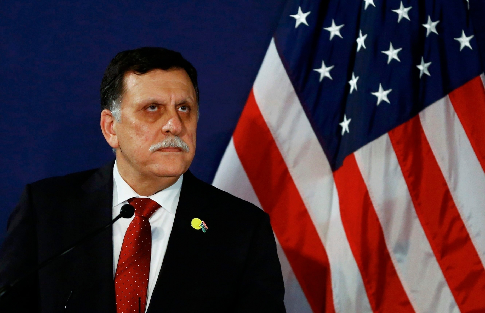 FILE - In this May 16, 2106 file-pool photo, Fayez al-Sarraj, the head of the U.N.-brokered presidency council, attends a news conference in Vienna, Austria. The U.S. launched multiple airstrikes against Islamic State militants Monday, Aug. 1, 2016, opening a new, more persistent front against the group at the request of the UN-backed Libyan government, Libyan and U.S. officials said. Serraj, said in a televised statement that American warplanes attacked the IS bastion of Sirte. No U.S. ground forces will be deployed, he said. (Leonhard Foeger/Pool Photo via AP, File) US Libya