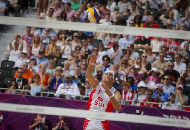 Les Suisses du Beachvolley (ici Sascha Heyer) ont remporté leur qualification pour les huitième de finales des JO2012.
