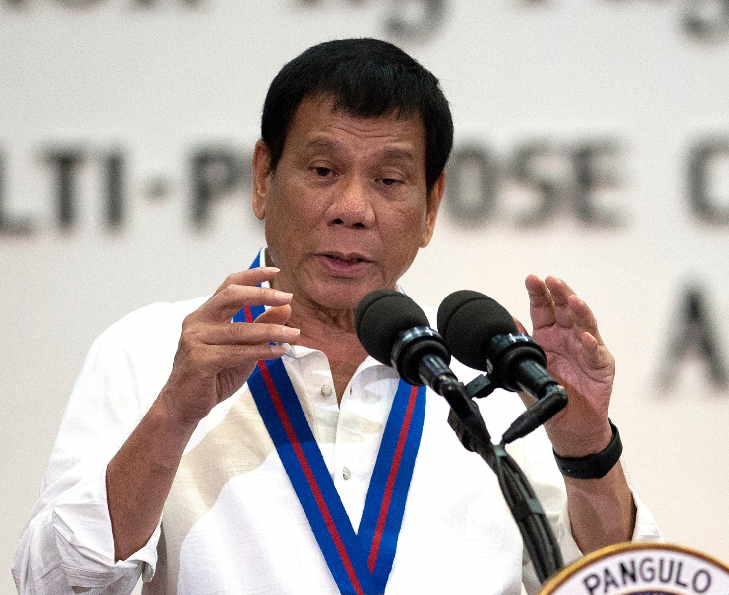 FILE - In this Wednesday, Aug. 17, 2016 file photo, Philippine President Rodrigo Duterte gestures as he talks during the 115th Police Service Anniversary at the Philippine National Police headquarters in Manila. The Philippines' brash-talking president has threatened to withdraw his country from the United Nations in his latest outburst against critics of his anti-drugs campaign that has left hundreds of suspects dead. Duterte ridiculed the U.N. as inutile, and lashed at U.S. police killings of black men. (Noel Celis/Pool Photo via AP, File) Philippines Duterte