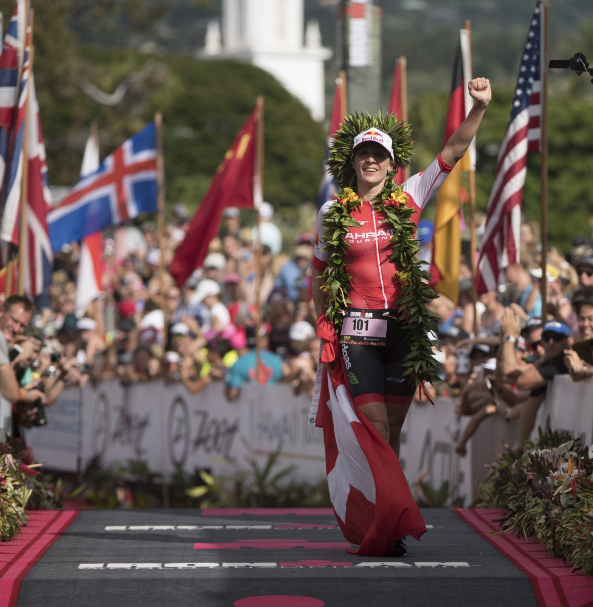 epa05577342 Daniela Ryf of Switzerland celebrates after crossing the finish line in the Ironman World Championship triathlon competition, in Hawaii, USA, 08 October 2016. Ryf successfully defended her title as the women's champion with an overall time of 8 hours, 46 minutes and 46 seconds.  EPA/BRUCE OMORI USA HAWAII IRONMAN