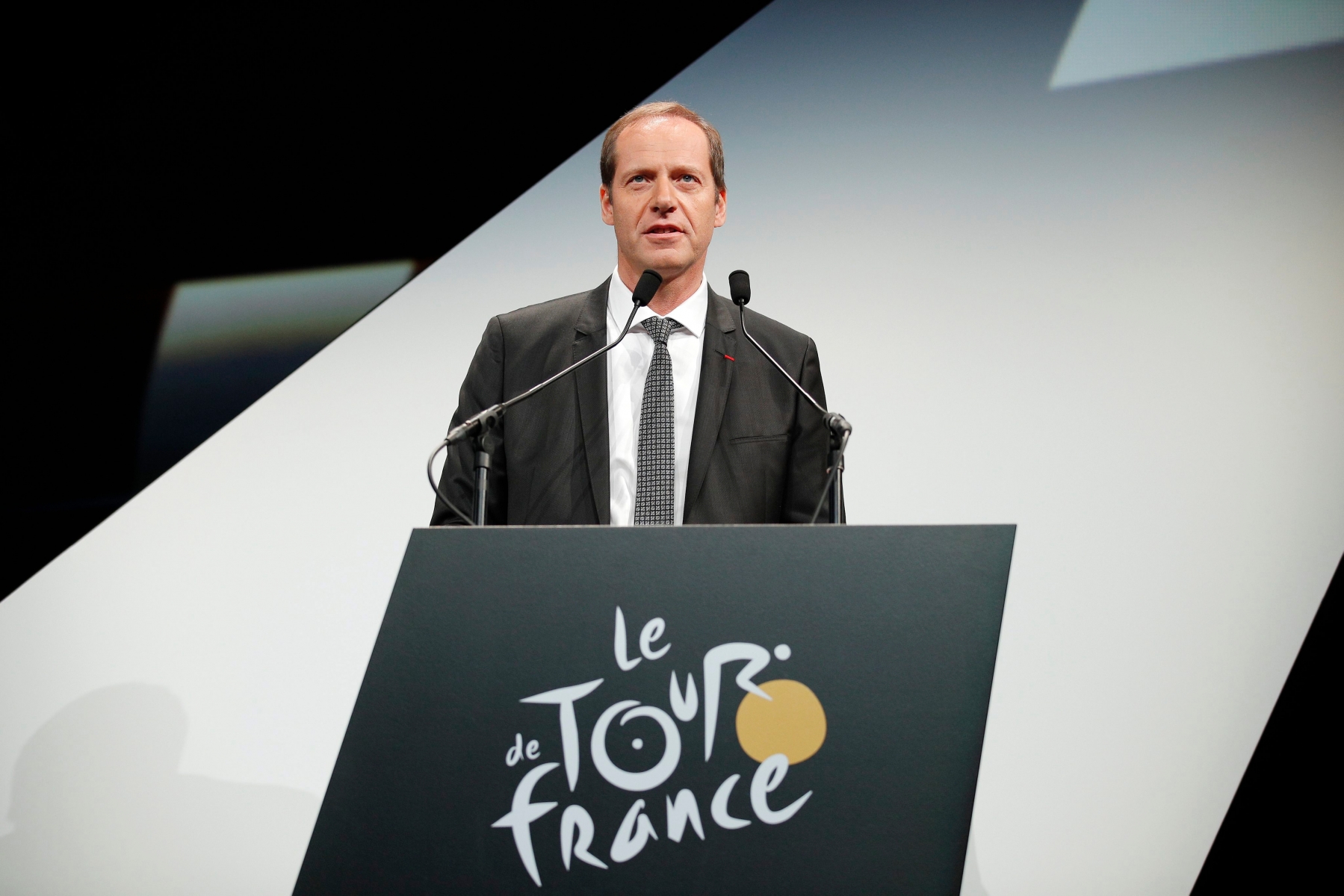 epa05590102 Tour de France General Director Christian Prudhomme delivers his speech during the presentation of the Tour de France 2017, in Paris, France, 18 October 2016. The 104th edition of the Tour de France cycling race will start on 01 July from Dusseldorf, Germany and arrive in Paris on 23 July 2016.  EPA/YOAN VALAT FRANCE CYCLING TOUR DE FRANCE 2017 PRESENTATION