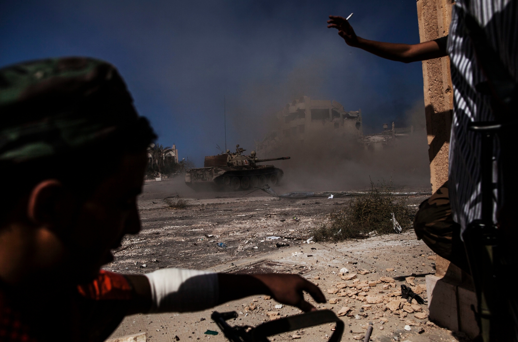 A tank of the Libyan forces, affiliated to the Tripoli government shoot against Islamic State positions in Sirte, Libya, Thursday, Sept. 22, 2016. The new offensive to retake the last district under control of Islamic State militants has left over over 5 Libyan fighters dead and wounded around 70. (AP Photo/Manu Brabo) Libya