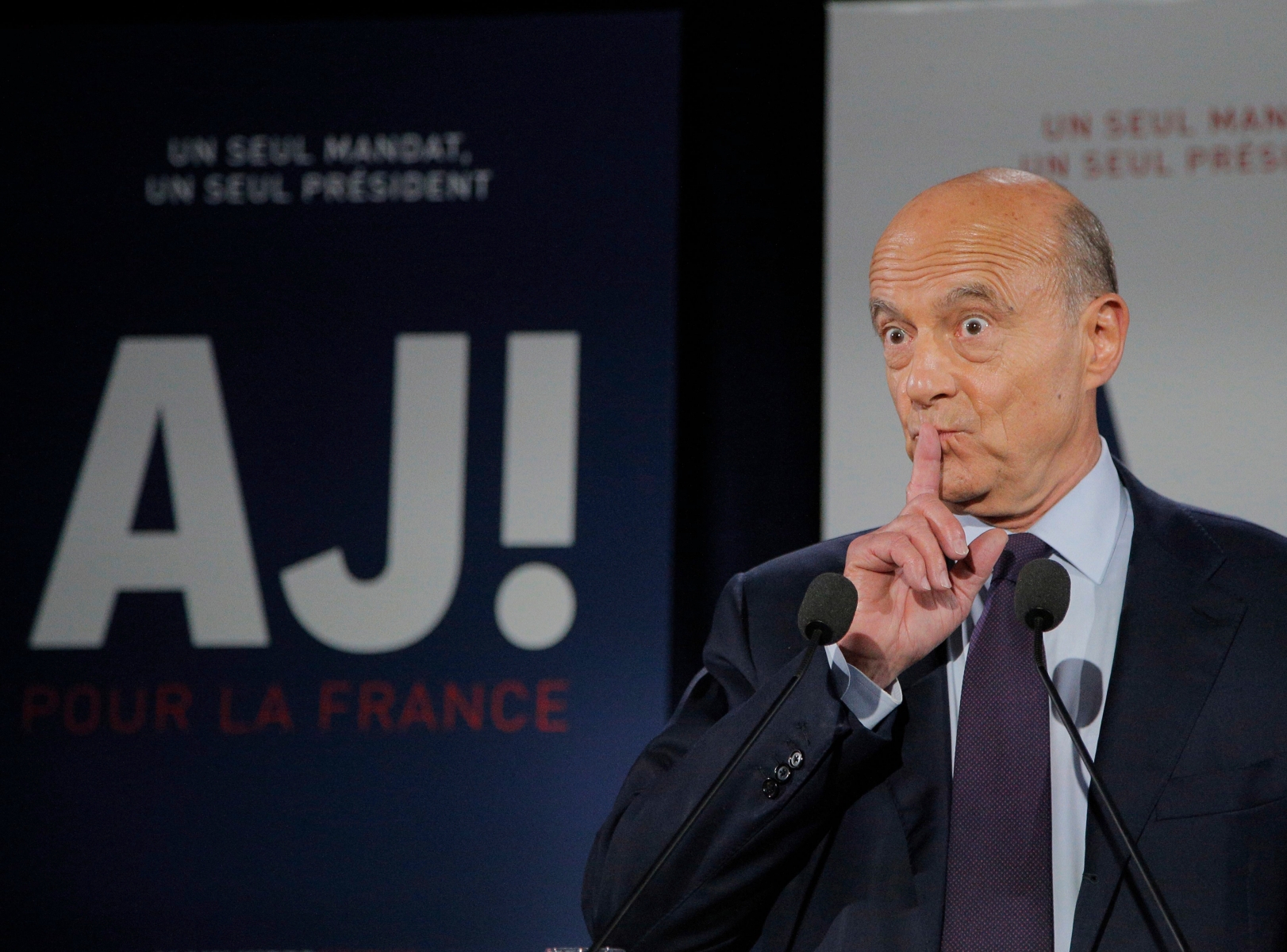 French presidential contender Alain Juppe gestures as he speaks after the first round of the nationwide conservatives primary in Paris, Sunday, Nov. 20, 2016. Ex-prime ministers Francois Fillon and Alain Juppe both outpolled France's former President Nicolas Sarkozy in early returns, and stand to advance to the Nov. 27 runoff. (AP Photo/Michel Euler) France Election