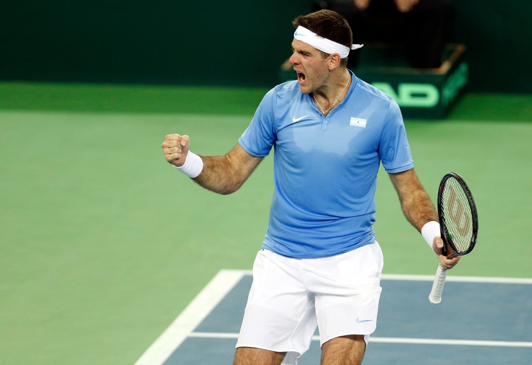 Argentina's Juan Martin Del Potro celebrates his victory over Croatia's Ivo Karlovic in their Davis Cup finals tennis singles match in Zagreb, Croatia, Friday, Nov. 25, 2016. (AP Photo/Darko Bandic) Croatia Tennis Davis Cup Argentina