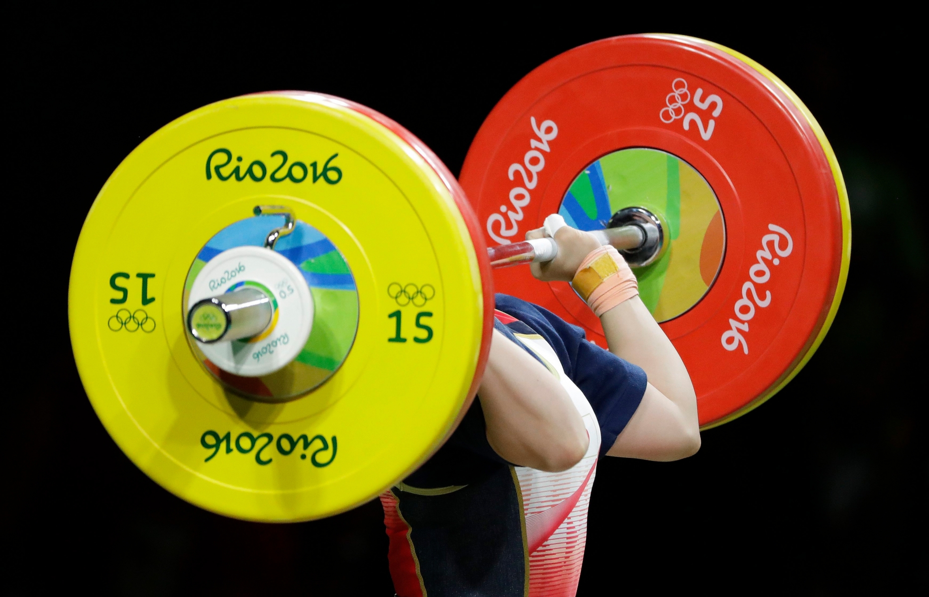 Kanae Yagi, of Japan, competes in the women's 53kg weightlifting competition at the 2016 Summer Olympics in Rio de Janeiro, Brazil, Sunday, Aug. 7, 2016. (AP Photo/Mike Groll) Rio Olympics Weightlifting Women