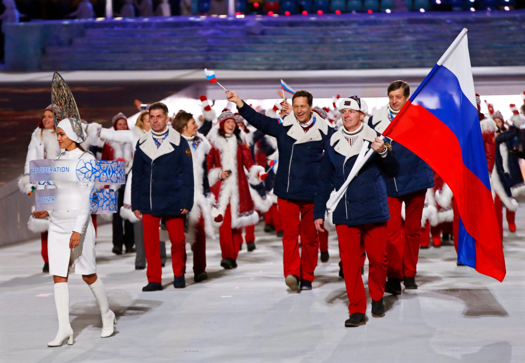 epa05667165 (FILE) A file picture dated 07 February 2014 of Team Russia with flag bearer Alexander Zubkov (R) during the Opening Ceremony of the Sochi 2014 Olympic Games at the Fisht Olympic Stadium in Sochi, Russia. According to a report presented by Richard McLaren, a member of the independent commission of the World Anti-Doping Agency (WADA), on 08 December 2016 in London, Britain, more than 1,000 Russian athletes were involved in state-sponsored doping since 2011, news reports stated.  EPA/BARBARA WALTON FILE RUSSIA DOPING