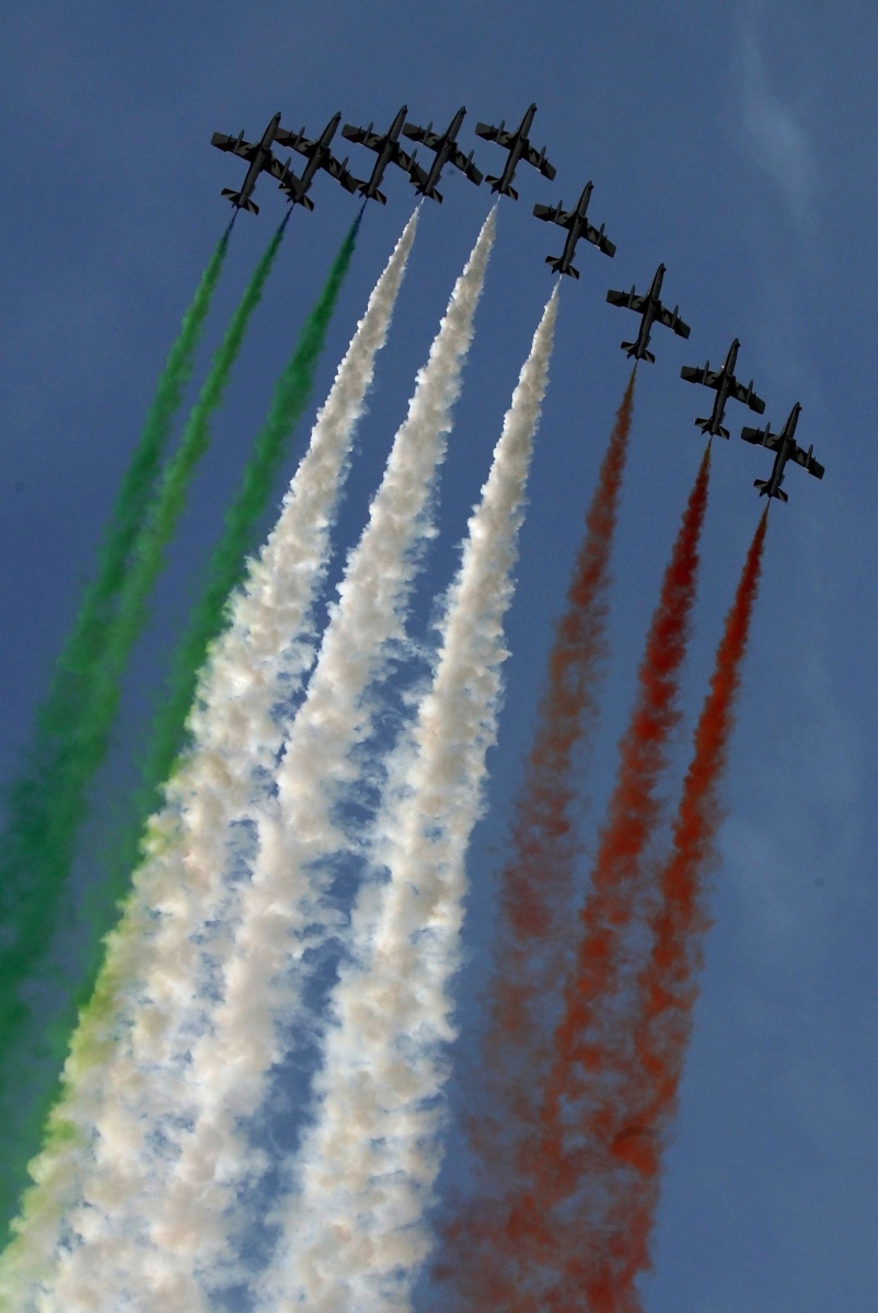 The jet acrobatic team Frecce Tricolori of the Italian Air Force fly in formation at the airshow Air 04 in Payerne, September 5, 2004. The airshow is one of the biggest in Europe this year, showing top international and national flying teams. Swiss Air Force takes the opportunity to celebrate the 90th anniversary of the founding of the Swiss Air Force and the 40th anniversary of their acrobatic jet team Patrouille Suisse.  (KEYSTONE/Fabrice Coffrini) SWITZERLAND AIR SHOW