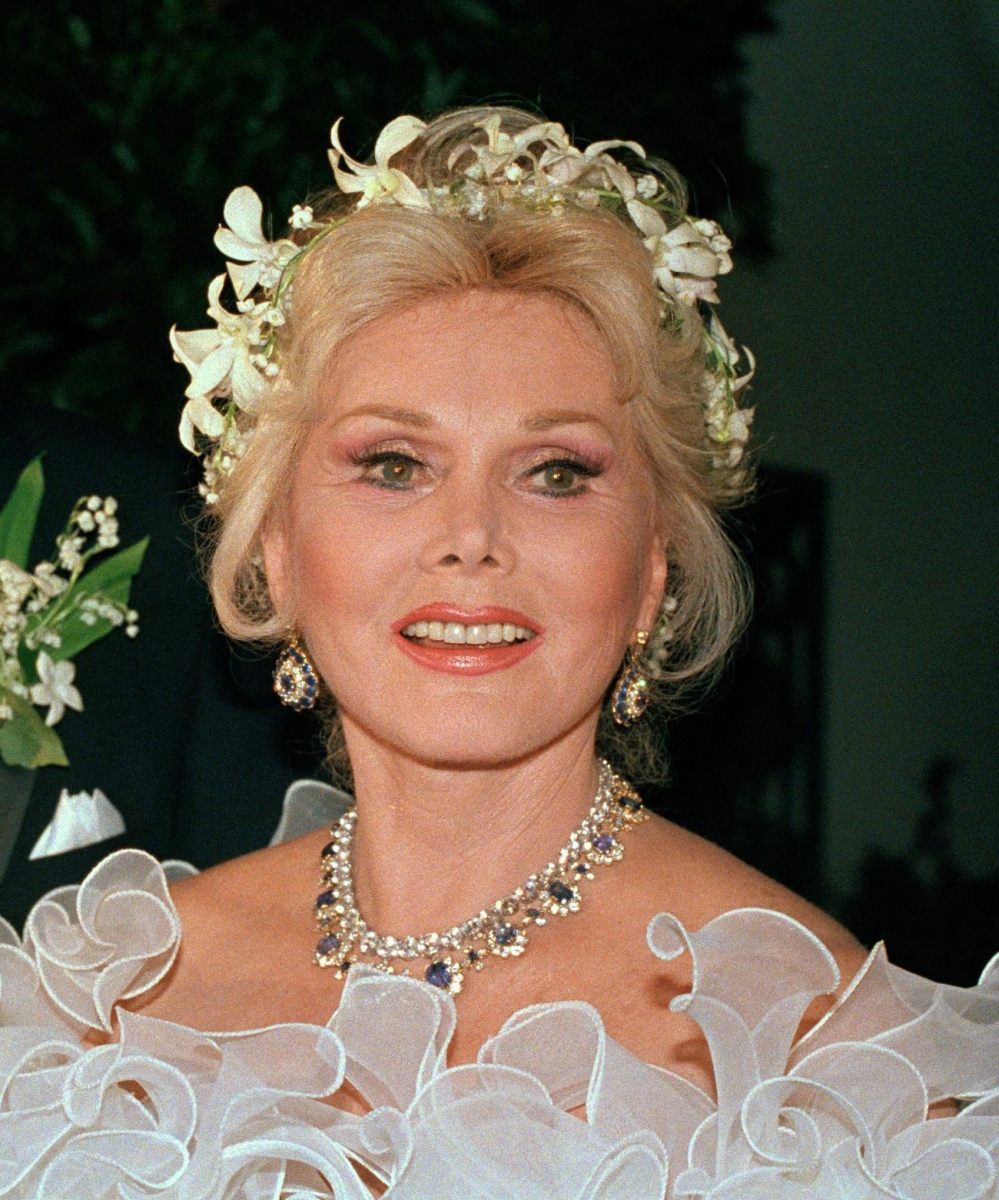FILE- In an Aug. 15, 1986 file photo, actress Zsa Zsa Gabor is shown Los Angeles. Gabor died Sunday, Dec. 18, 2016, of a heart attack at her Bel-Air home, her husband, Prince Frederic von Anhalt, said. She was 99. (AP Photo/File) Obit Zsa Zsa Gabor