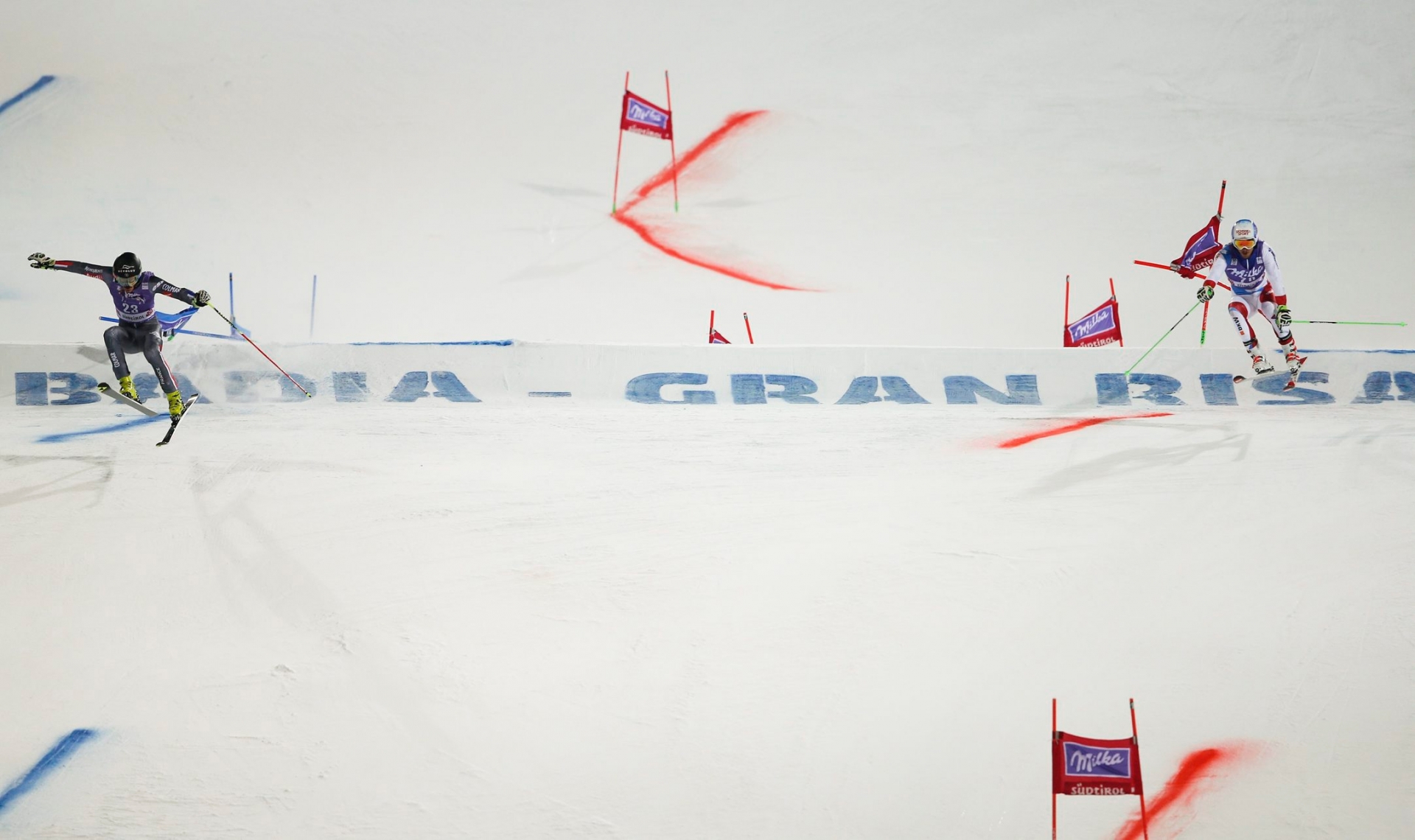 France's Cyprien Sarrazin, left, competes alongside Switzerland's Carlo Janka on his way to win an alpine ski, men's World Cup giant slalom, in Alta Badia Italy, Sunday Dec. 18, 2016. (AP Photo/Marco Trovati) Italy Alpine Skiing World Cup