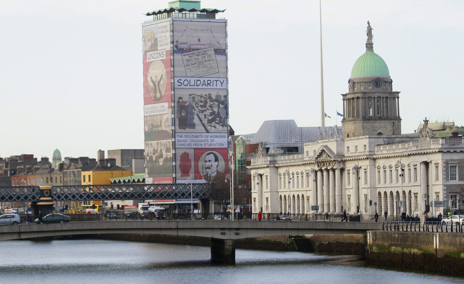 A general view of the customs house building and the River Liffey in the centre of Dublin, Ireland,  Friday,Dec. 13, 2013. On Sunday, Ireland officially ends its reliance on a 67.5 billion-euro ($93 billion) loan program that European governments and the International Monetary Fund provided in 2010 to save the Irish from national bankruptcy. Ireland's finance chief says the country's exit from its international bailout this week should be celebrated as a eurozone triumph, but won't mean an end to austerity for the debt-battered Irish.  (AP Photo/Peter Morrison) Ireland IMF