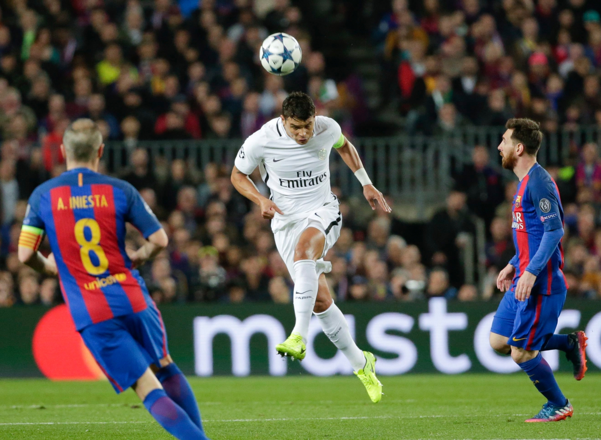 PSG's Thiago Silva heads the ball during the Champion's League round of 16, second leg soccer match between FC Barcelona and Paris Saint Germain at the Camp Nou stadium in Barcelona, Spain, Wednesday March 8, 2017. (AP Photo/Emilio Morenatti) Spain Soccer Champions League