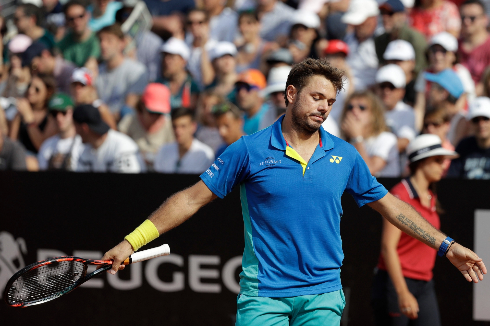 Switzerland's Stan Wawrinka reacts after losing a point during his match against John Isner, of the U.S. at the Italian Open tennis tournament, in Rome, Thursday, May 18, 2017. (AP Photo/Gregorio Borgia) Italy Tennis Italian Open