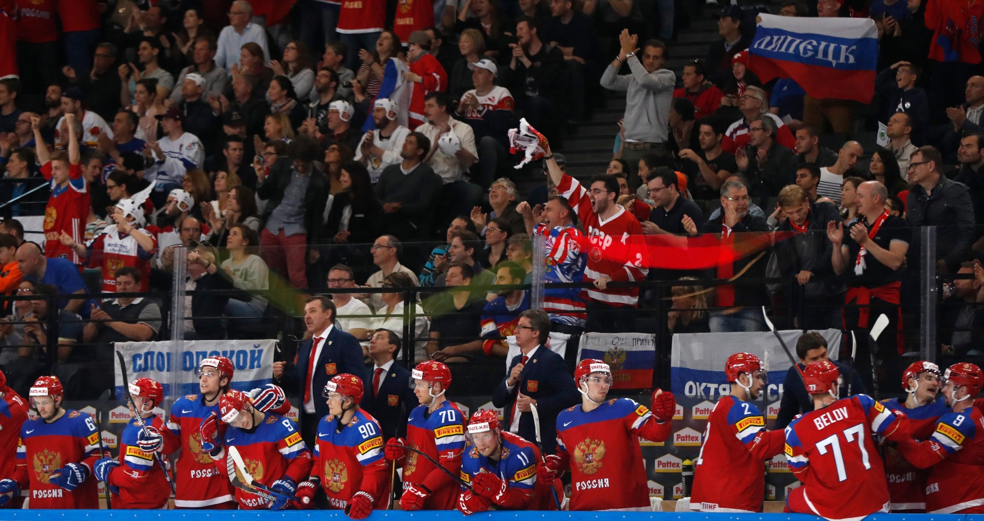 Players and fans of Russia celebrate after scoring a goal during the Ice Hockey World Championships quarterfinal match between Russia and Czech Republic in the AccorHotels Arena in Paris, France, Thursday, May 18, 2017. (AP Photo/Petr David Josek) France Hockey Worlds