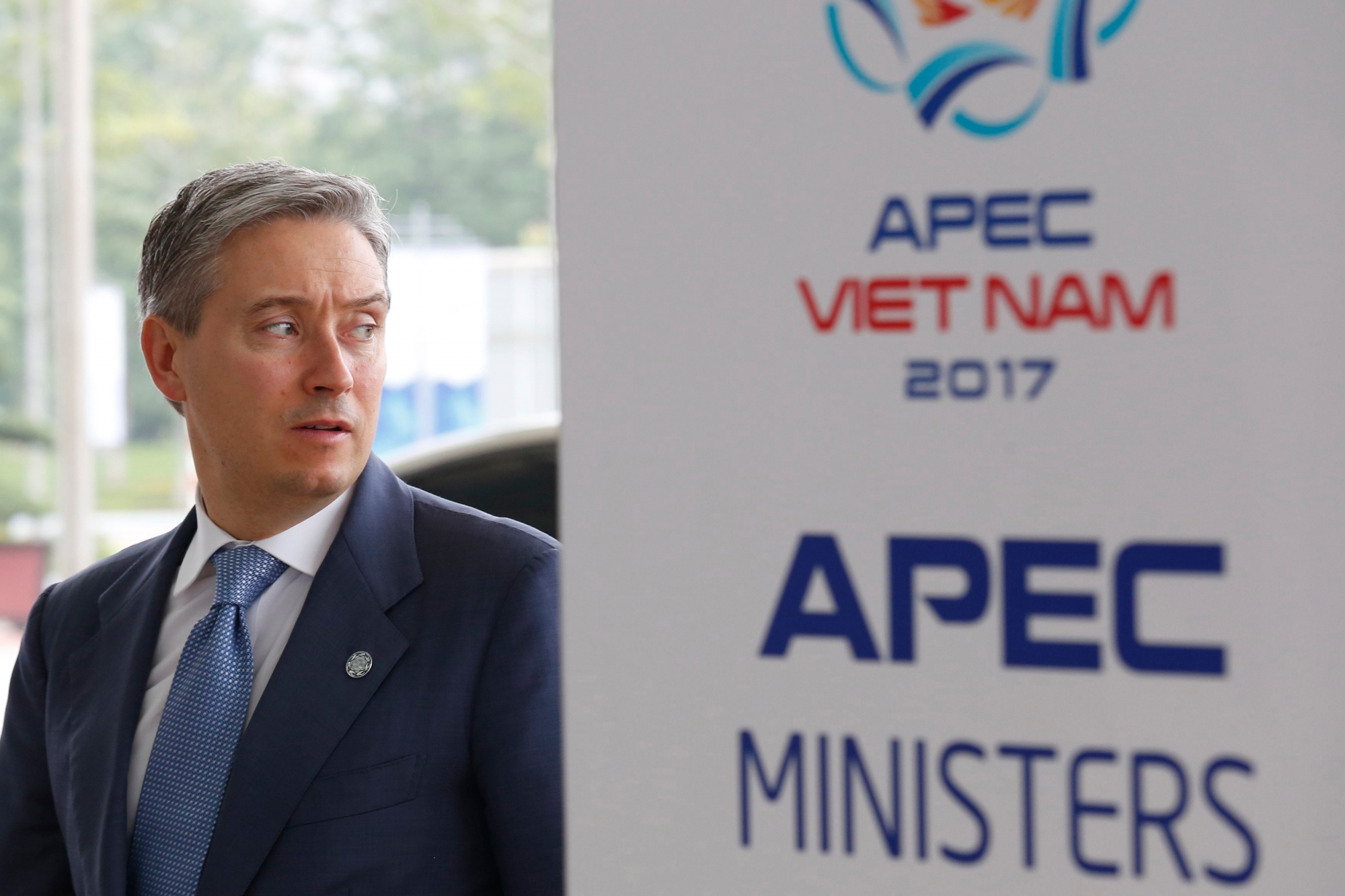 epa05978194 Canada's International Trade Minister Francois-Philippe Champagne walks to the meeting room, during the APEC Ministers Responsible For Trade (APEC MRT 23) meeting in Hanoi, Vietnam, 21 May 2017.  EPA/KHAM / POOL VIETNAM APEC