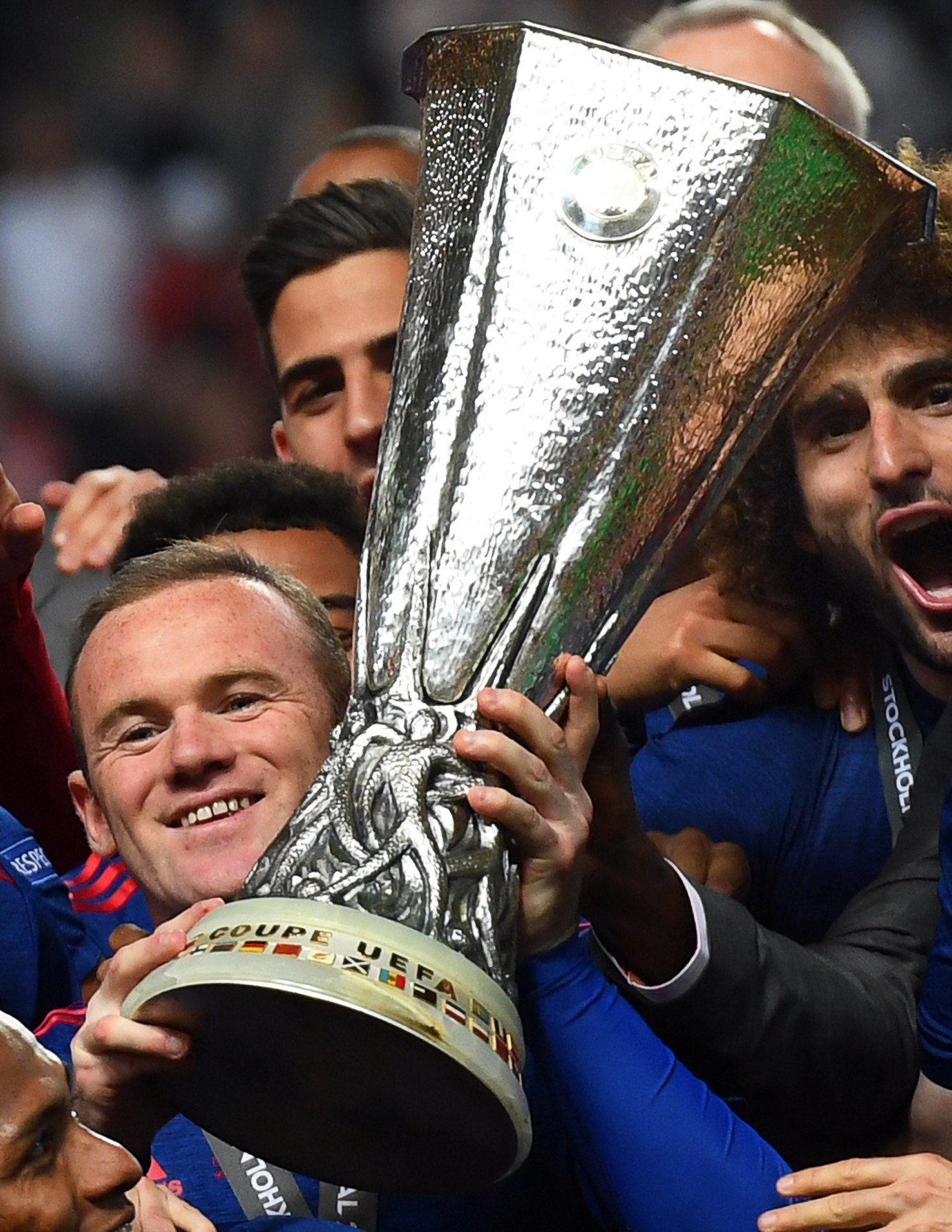 epa05987791 Manchester United's Wayne Rooney celebrates with the trophy after the UEFA Europa League final between Ajax Amsterdam and Manchester United at Friends Arena in Stockholm, Sweden, 24 May 2017. ManU won 2-0.  EPA/GEORGI LICOVSKI SWEDEN SOCCER UEFA EUROPA LEAGUE FINAL