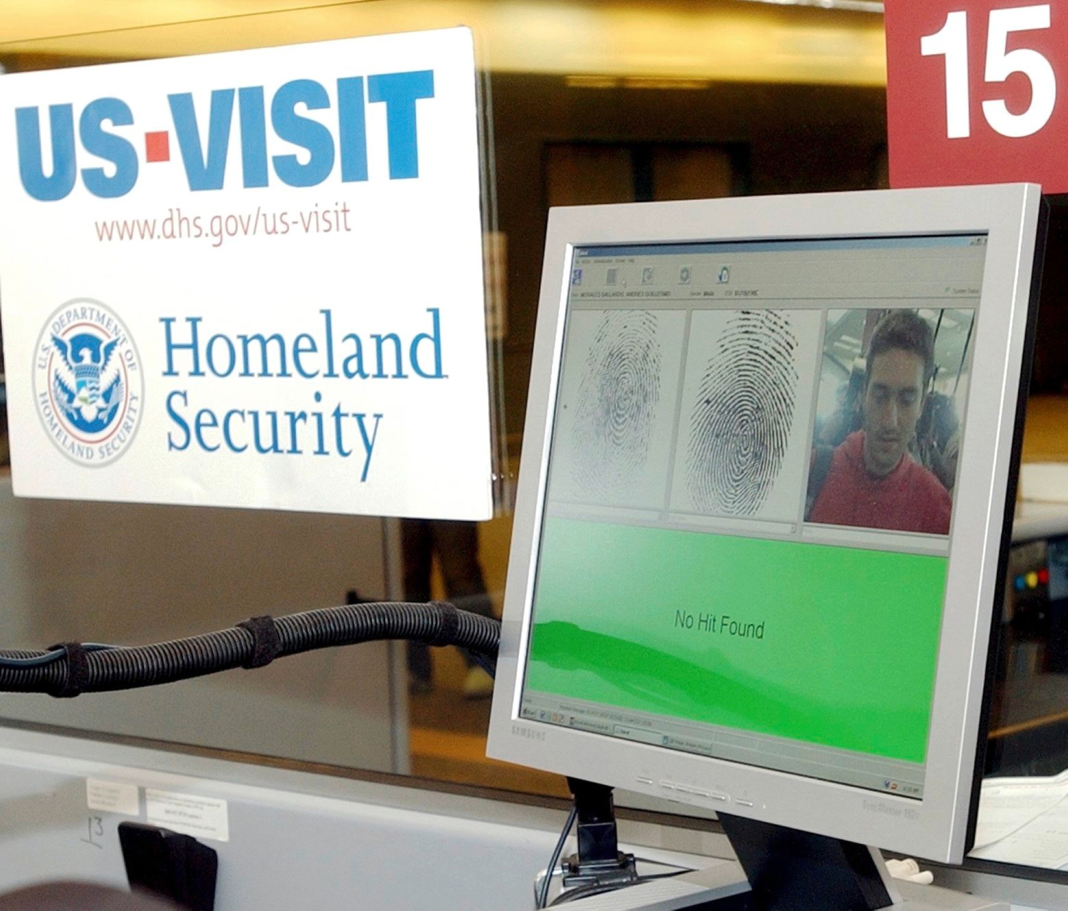 The US-VISIT system shows "No Hit Found" as it displays the fingerprints and photo of engineering student Andres Morales as it cleared him through customs at Hartsfield Jackson International Airport in Atlanta, Monday, Jan. 5, 2004 using the US-VISIT system. His fingerprints and photo are displayed on the monitor. The system then checks him through a database. He arrived on a Delta flight from Santiago. (KEYSTONE/AP Photo/Ric Feld) USA AIRPORT SECURITY