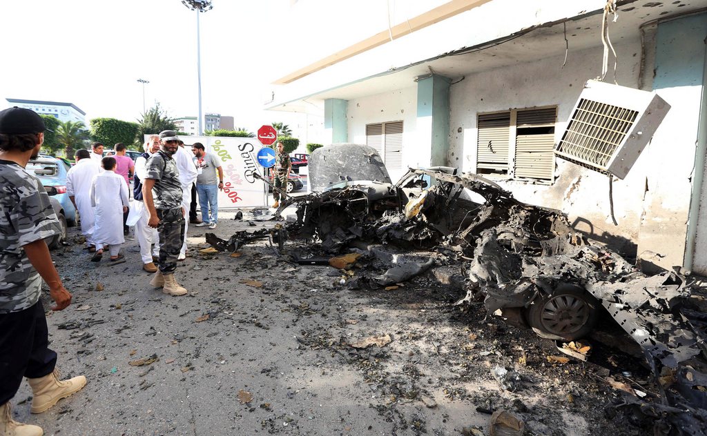 La Libye a annoncé avoir arrêté 32 partisans de l'ancien dirigeant libyen Mouammar Kadhafi après les attaques à la voiture piégée qui ont fait deux morts dimanche à Tripoli. 