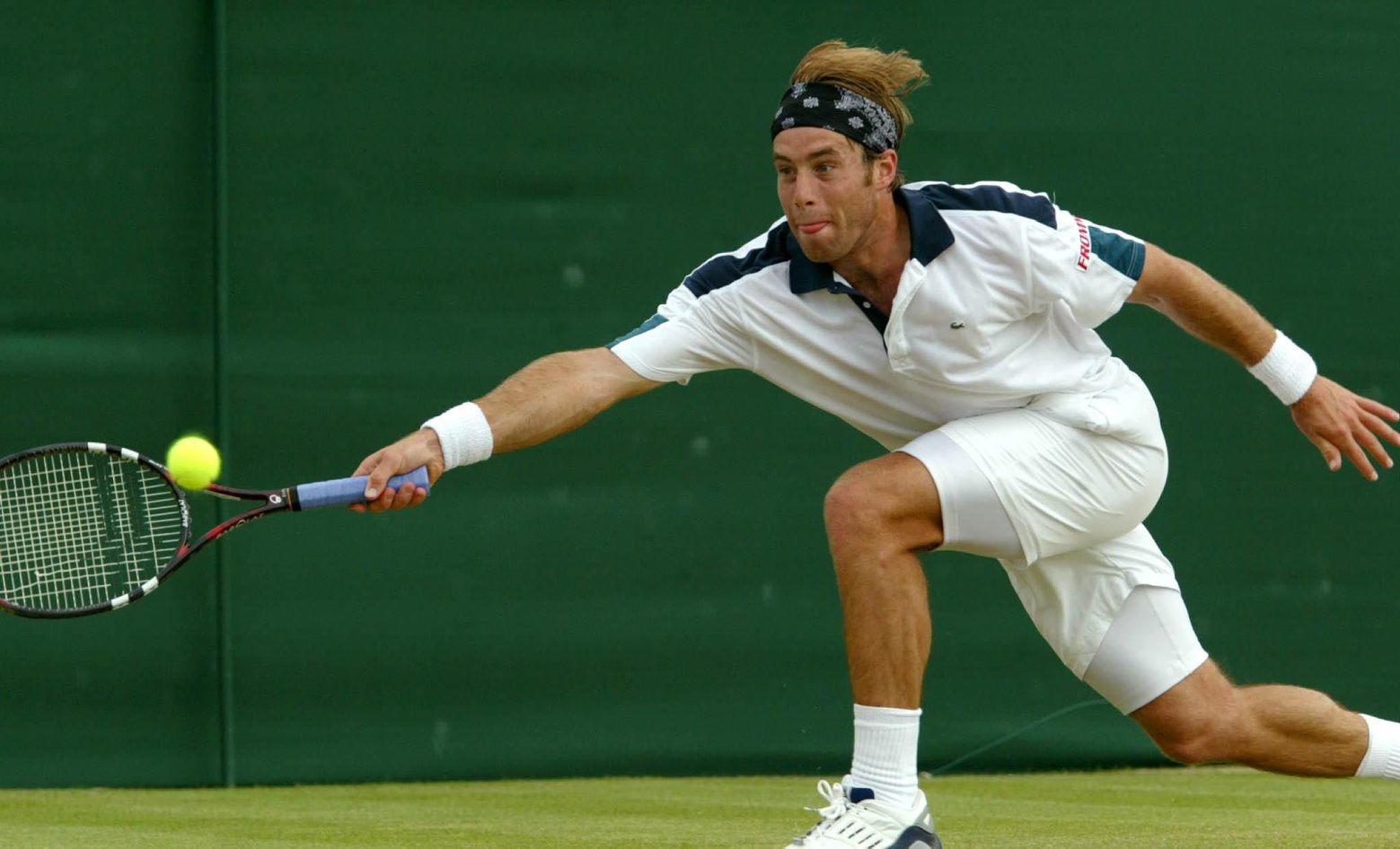 WIM102 - 20020628 - WIMBLEDON, UNITED KINGDOM : Swiss George Bastl plays a forehand during his third round match against David Nalbandian of Argentina at the Wimbledon Tennis Championships, 28 June 2002. Bastl, who defeated Pete Sampras in the second round, lost in straight sets today.
EPA PHOTO EPA SRDJAN SUKI gh TENNIS WIMBLEDON - GEORGE BASTL
