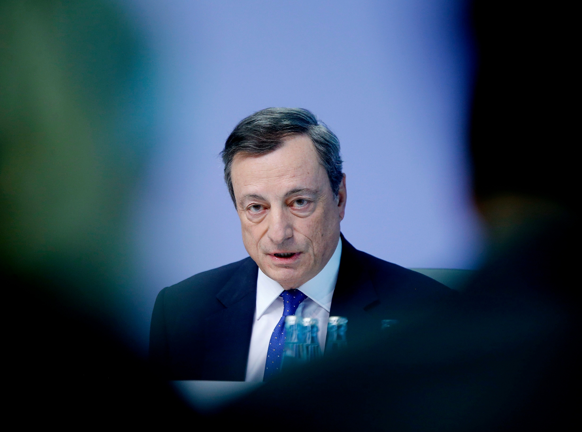 FILE - In this Thursday, April 27, 2017 file photo, the President of the European Central Bank Mario Draghi speaks during a news conference in Frankfurt, Germany. European Central Bank head Mario Draghi is likely to tread softly on Thursday, July 20, 2017 as the bank inches toward bringing an end to its monetary stimulus efforts.  (AP Photo/Michael Probst, File) EU Europe Economy