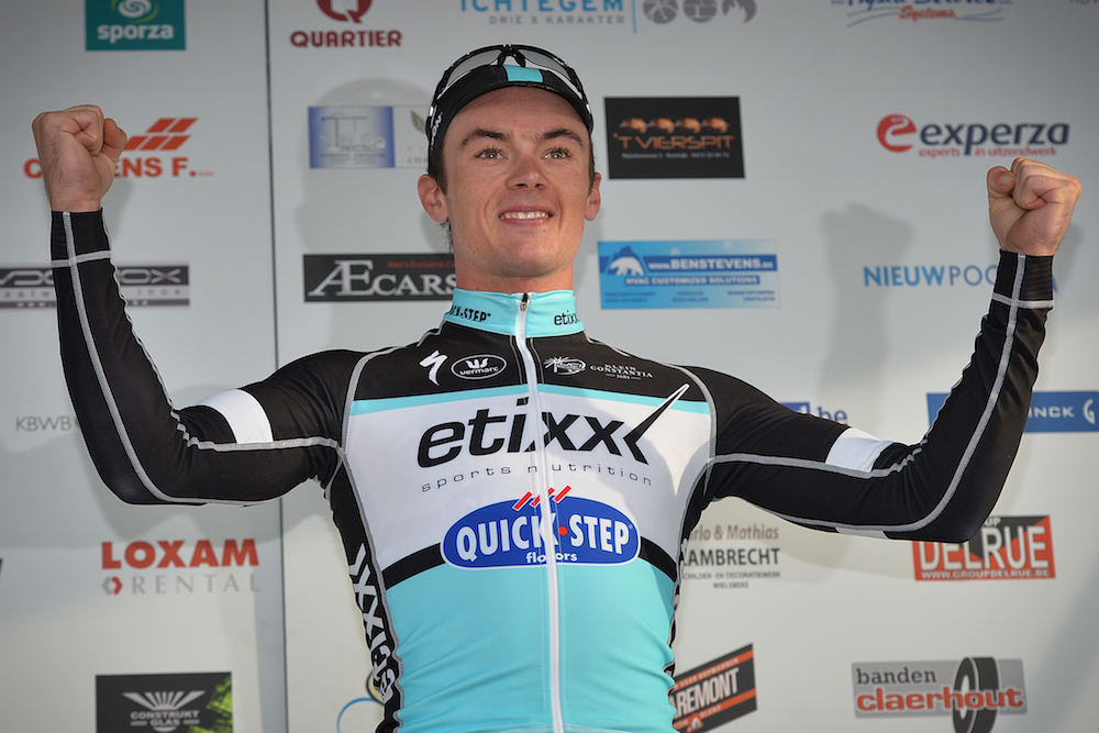 Belgian Yves Lampaert of team Ettix-Quick-Step celebrates on the podium on March 7, 2015 after winning the second day of the three-day Tour of Flanders cycling race, 174,1 km, from Brugge to Harelbeke.
                            AFP PHOTO / BELGA /DAVID STOCKMAN   - BELGIUM OUT - CYCLING-BEL-FLANDERS