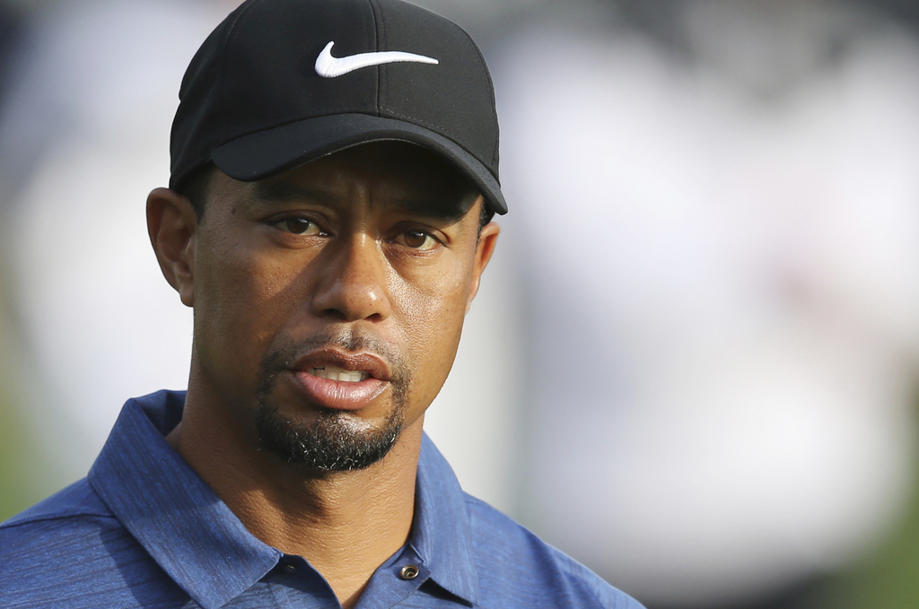 Absent des greens depuis janvier dernier pour soigner son dos, Tiger Woods peut désormais s'entraîner sans restrictions. (Archives)