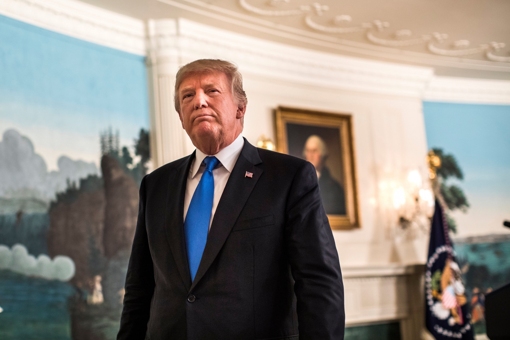 epa06263975 US President Donald J. Trump departs after announcing that he is withdrawing presidential certification of the Iran nuclear deal in the Diplomatic Room of the White House in Washington, DC, USA, 13 October 2017. The move leaves Congress with 60 days to decide whether to reimpose sanctions on Iran.  EPA/JIM LO SCALZO USA TRUMP IRAN