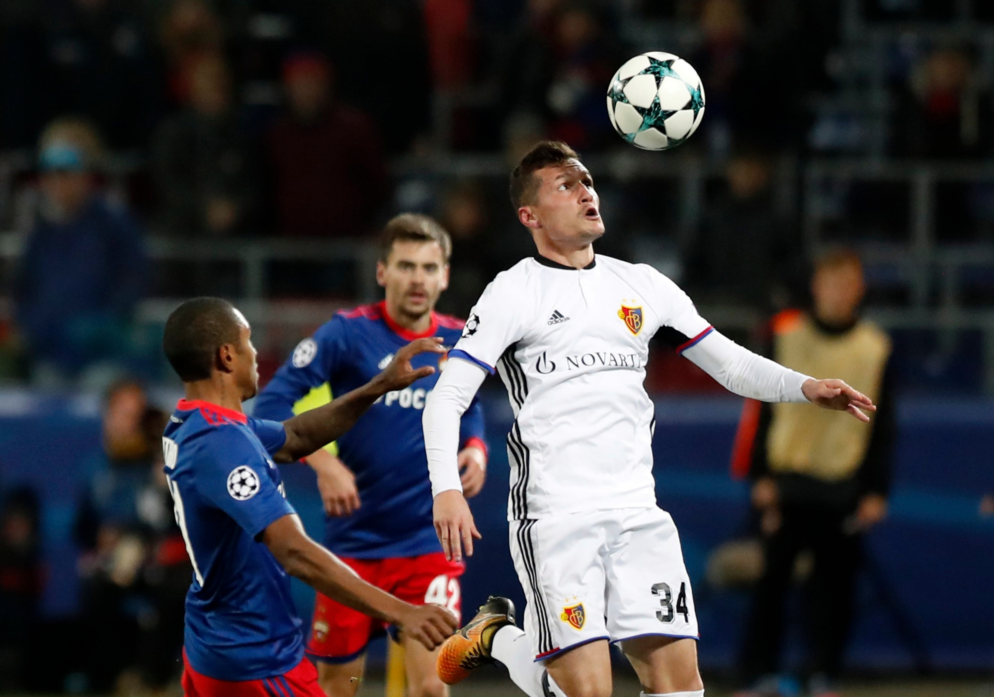 Basel's Taulant Xhaka, right, challenges for the ball with CSKA's Vitinho during the Champions League Group A soccer match between CSKA Moscow and Basel in Moscow, Russia, Wednesday, Oct. 18, 2017. (AP Photo/Pavel Golovkin) Russia Soccer Champions League