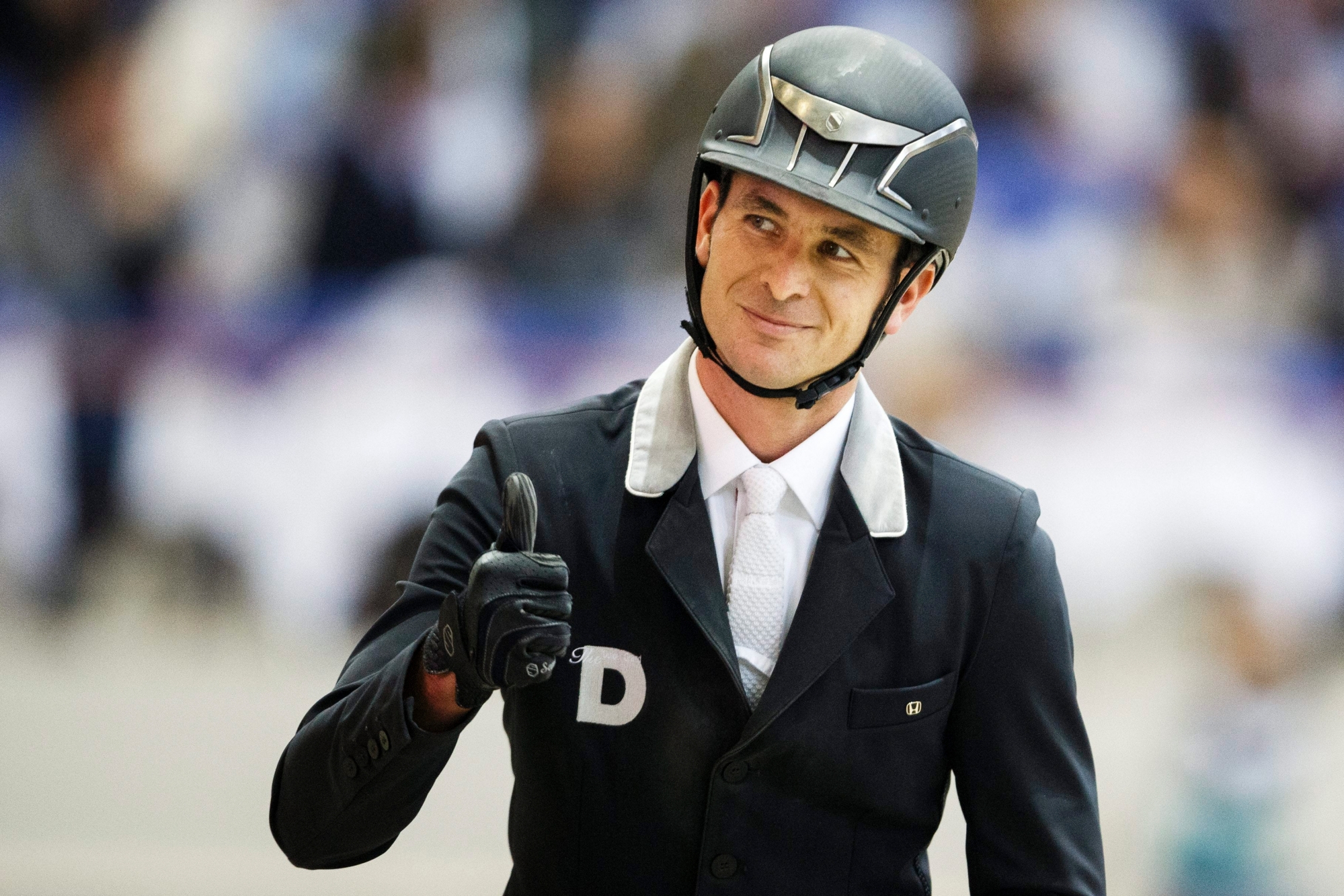 Steve Guerdat from Switzerland reacts after riding his horse Nino des Buissonnets to win the first place of the Rolex Grand Prix of show jumping at the 55th CHI international horse show jumping tournament in Geneva, Switzerland, on Sunday, December 13, 2015. (KEYSTONE/Valentin Flauraud) SWITZERLAND CHI GENEVA