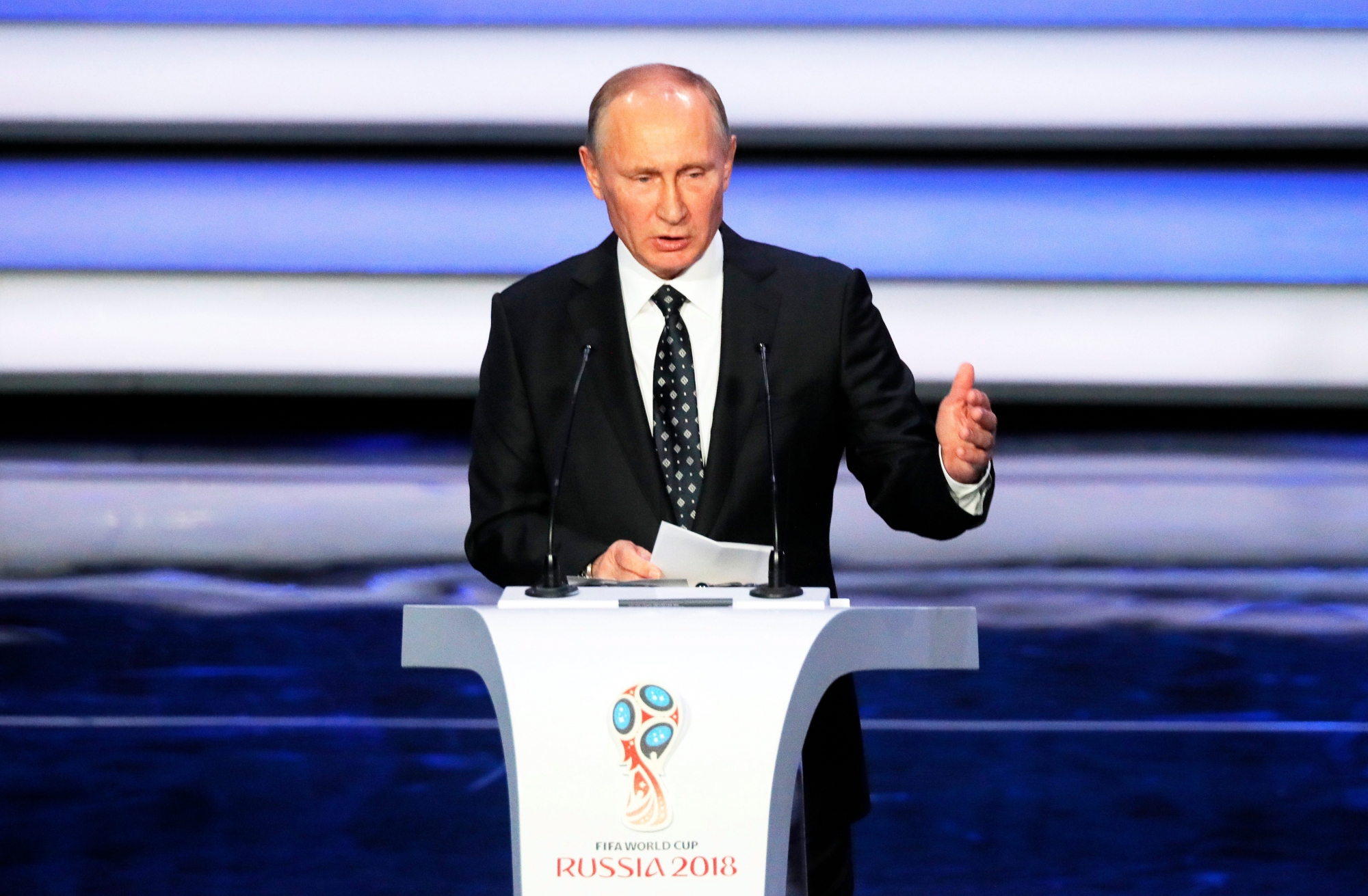 epa06361729 Russian President Vladimir Putin delivers a speech during the Final Draw of the FIFA World Cup 2018 at the State Kremlin Palace in Moscow, Russia, 01 December 2017. The FIFA World Cup 2018 will take place from 14 June until 15 July 2018 in Russia.  EPA/YURI KOCHETKOV RUSSIA SOCCER DRAW FIFA WORLD CUP 2018