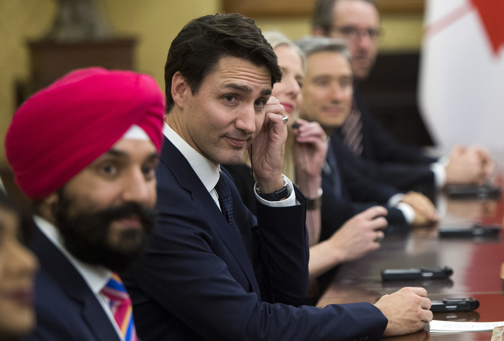 "Nous continuerons de défendre les principes d'égalité et de liberté", a assuré Navdeep Bains (au premier plan).