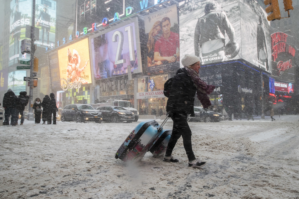 A New York, les rues de Manhattan étaient couvertes de neige ce jeudi.