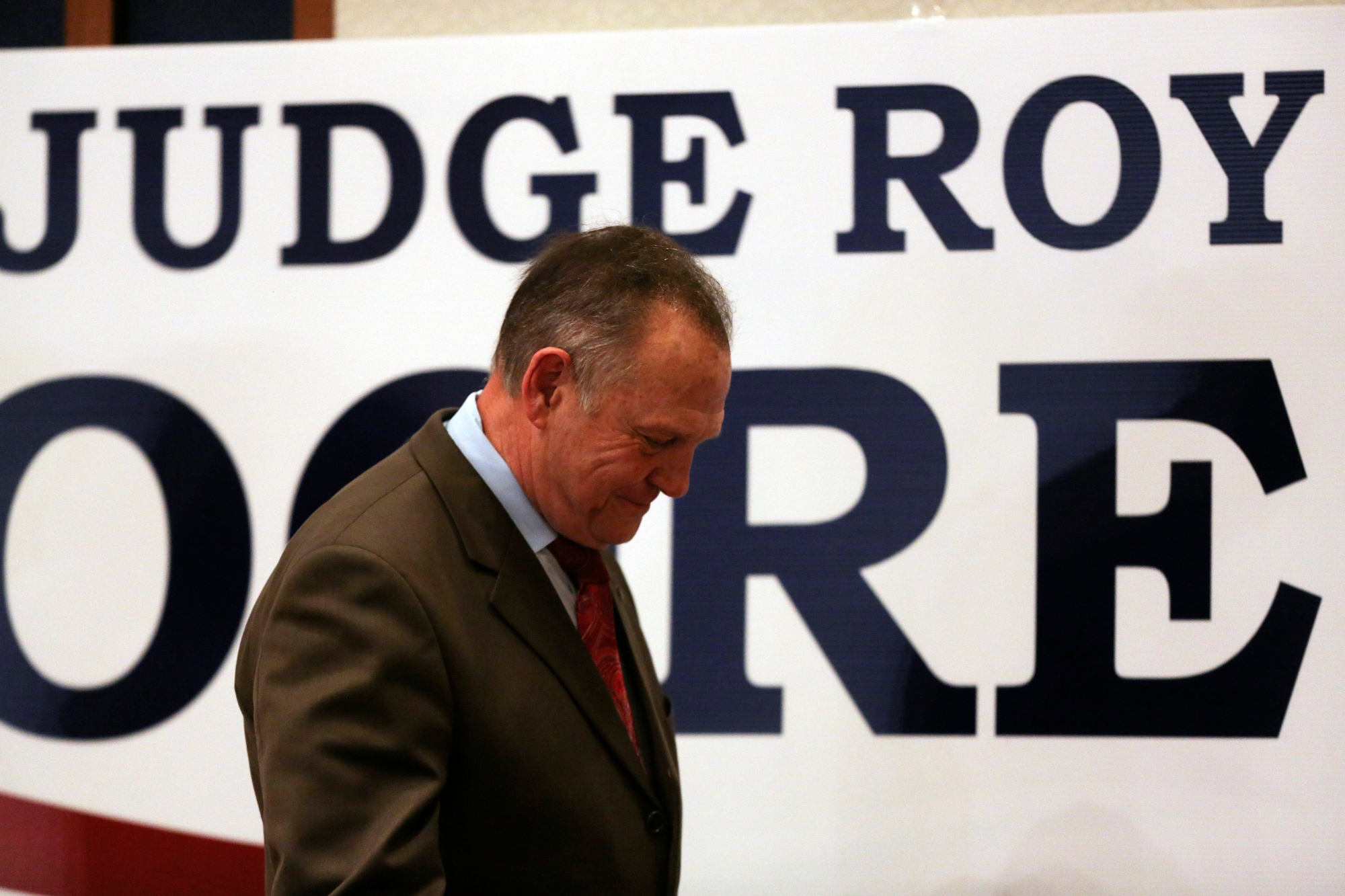 epaselect epa06386179 Republican Senate candidate Roy Moore walks off stage saying he would not concede defeat till all the votes were in and possibly demand a recount, at his watch party in Montgomery, Alabama, USA, 12 December 2017.  Citizens of Alabama voted to decide whether Republican Roy Moore or Democrat Doug Jones will hold a Senate seat in the Federal government. According to media reports, Democratic Party candidate Doug Jones won the election.  EPA/DAN ANDERSON epaselect USA ELECTION SENATE ALABAMA ROY MOORE