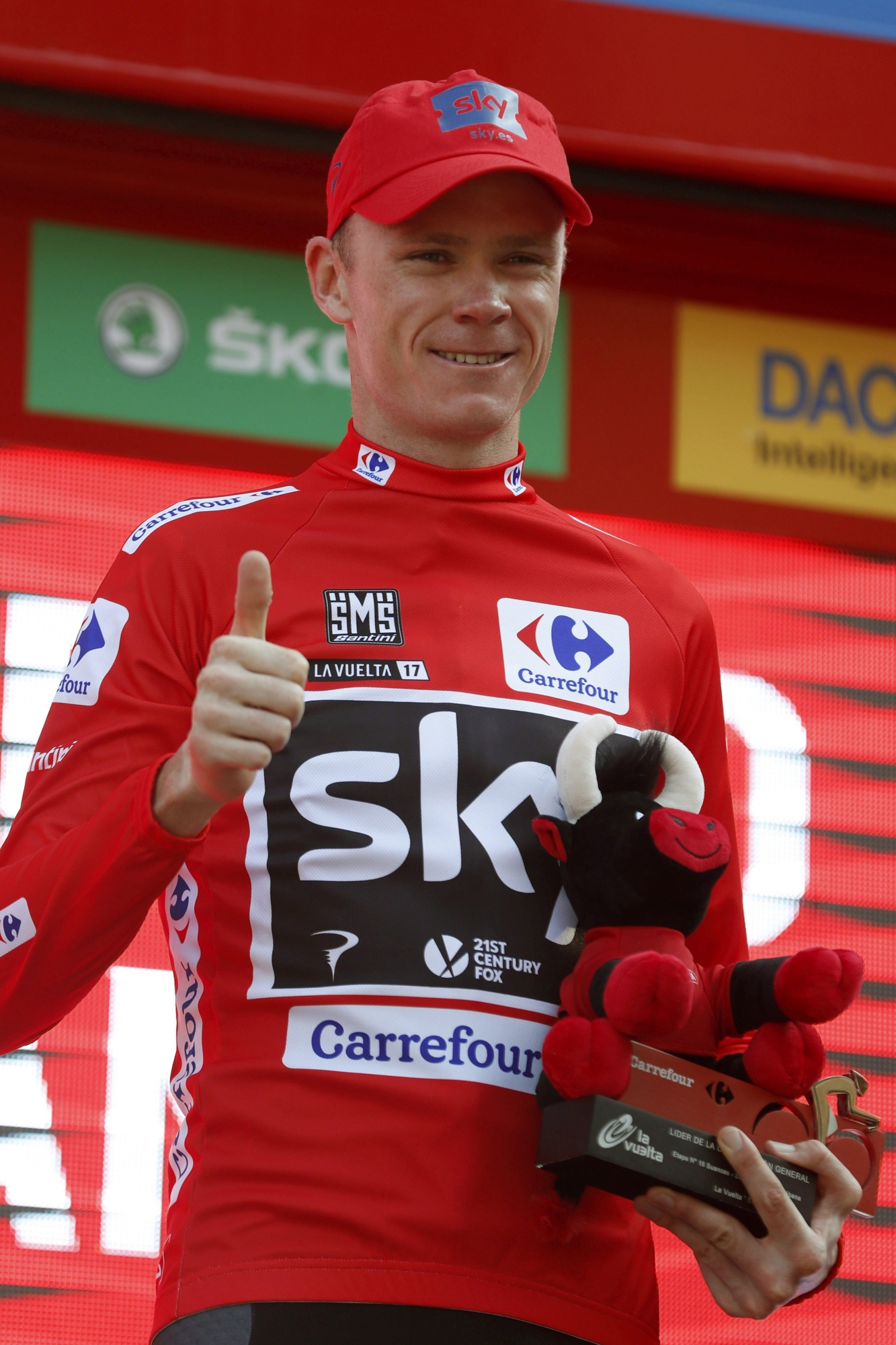 epa06386395 (FILE) - British cyclist Chris Froome of Sky Team celebrates on the podium retaining the overall leader's red jersey after the 18th stage of the Vuelta a Espana cycling race, over 169km from Suances to Santo Toribio de Liebana, Spain, 07 September 2017(reissued 13 December 2017). According to news reports, Froome had failed a drug test during the La Vuelta cycling tour in September 2017, testing positive for an excessive level of a legal asthma drug.  EPA/Javier Lizon (FILE) SPAIN CYCLING VUELTA FROOME