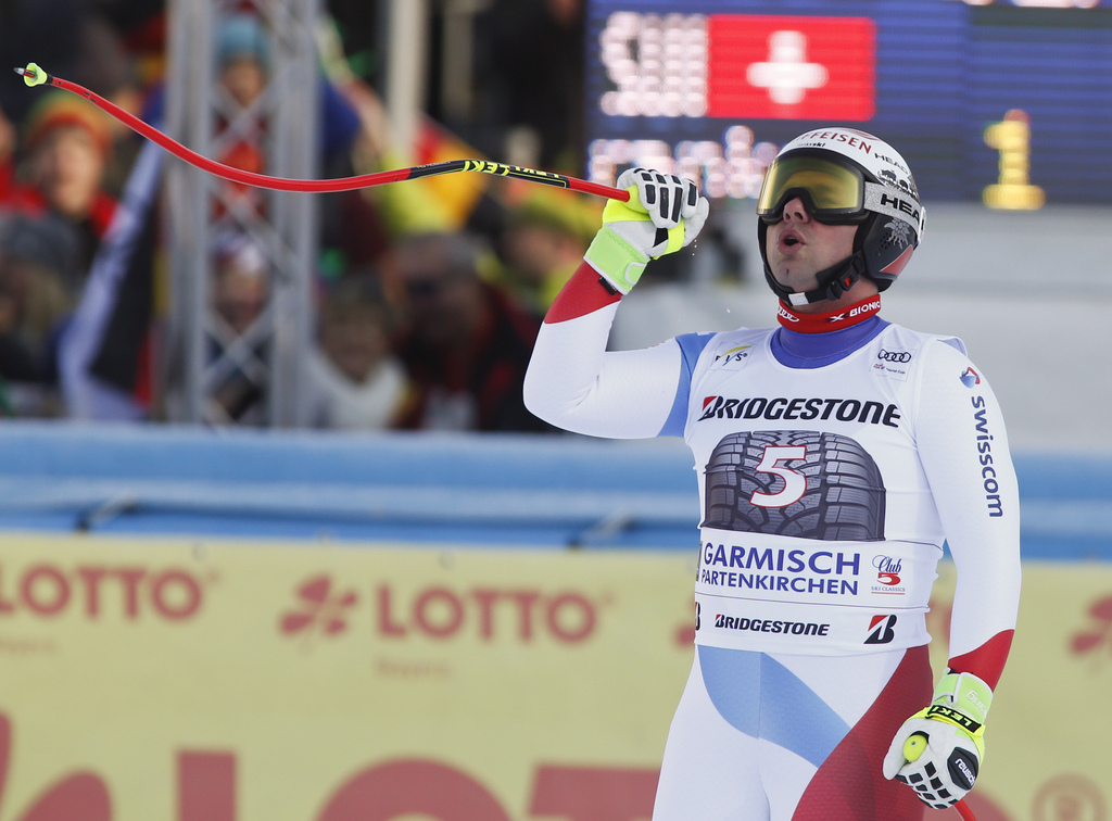 Beat Feuz of Switzerland gets to the finish area after completing alpine ski, men's World Cup downhill, in Garmisch-Partenkirchen, Germany, Saturday, Jan. 27, 2018. (AP Photo/Giovanni Auletta)