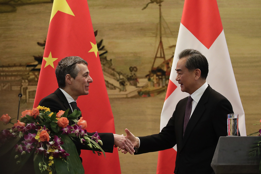 Lors de sa visite de trois jours dans l'Empire du Milieu, le chef de la diplomatie suisse s'est fixé comme objectif de renforcer les relations entre la Suisse et la Chine.