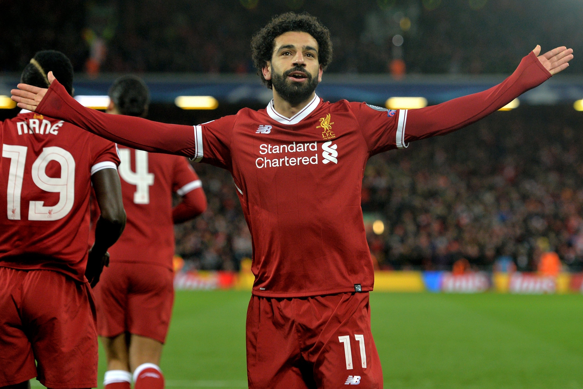 epa06645834 Liverpool's Mohamed Salah celebrates after scoring the 1-0 lead during the UEFA Champions League quarter final first leg match between FC Liverpool and Manchester City at Anfield Road, Liverpool, Britain, 04 April 2018.  EPA/PETER POWELL BRITAIN SOCCER UEFA CHAMPIONS LEAGUE