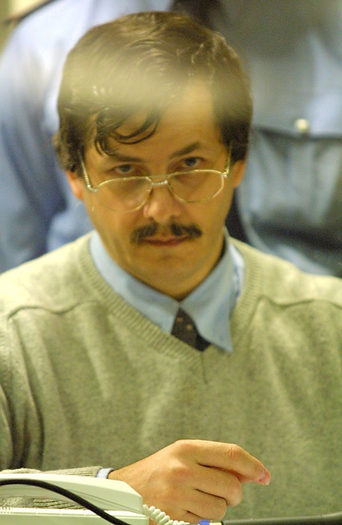 Main accused Marc Dutroux at the Arlon assize court, Thursday 10 June 2004, during a session of the trial of Marc Dutroux and his accomplices Michelle Martin, Michel Lelievre and Michel Nihoul.  EPA/JEAN-CHRISTOPHE VERHAEGEN / POOL