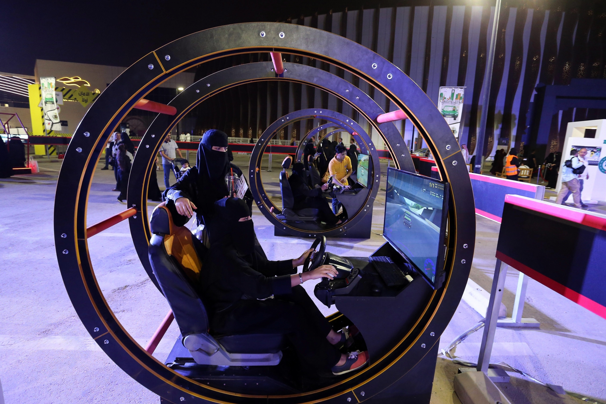 epa06829120 Saudi women attend a preparatory event on car driving organized by the department of Traffic, in Riyadh, Saudi Arabia, 21 June 2018. Saudi women will be allowed to drive in the country as a controversial driving ban will be lifted on 24 June.  EPA/AHMED YOSRI SAUDI ARABIA TRANSPORT DRIVING WOMEN