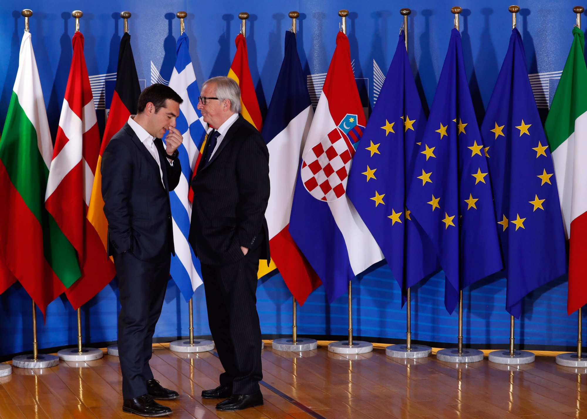 epa06836666 Greek Prime Minister Alexis Tsipras (L) is welcomed by European Commission President Jean-Claude Juncker (R) for an informal meeting on migration and asylum issues in Brussels, Belgium, 24 June 2018. European Commission President Jean-Claude Juncker hosts the gathering ahead of a full summit of all 28 European Union leaders to overhaul the EU asylum system on June 28.  EPA/YVES HERMAN / POOL BELGIUM EU MIGRATION ASYLUM