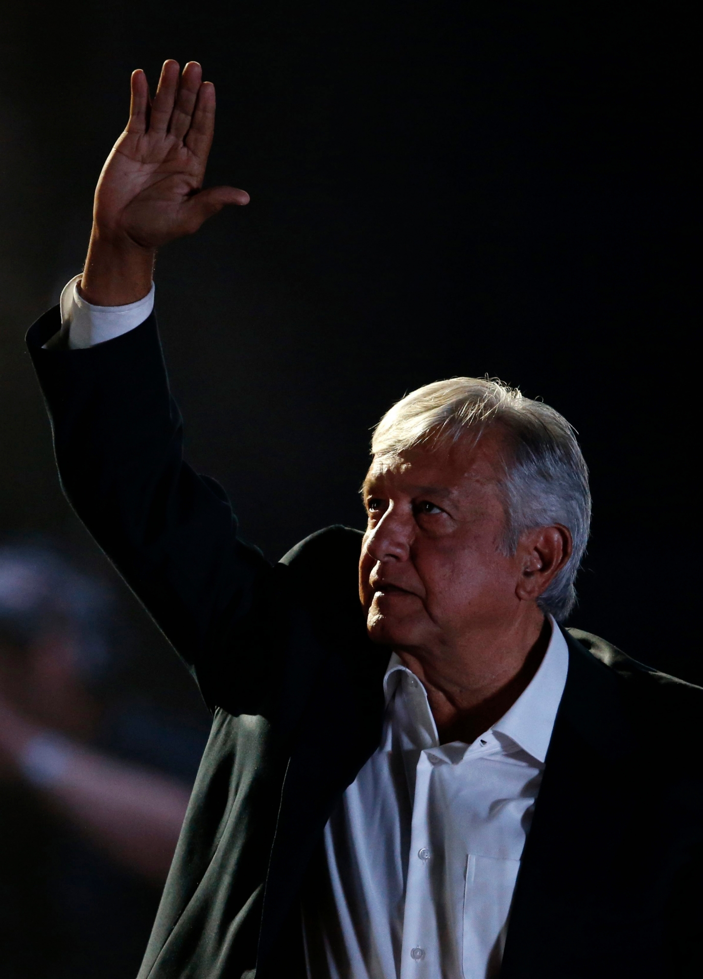 Presidential candidate Andres Manuel Lopez Obrador, of the MORENA party, holds his closing campaign rally at Azteca stadium in Mexico City, Wednesday, June 27, 2018. Mexico's four presidential candidates are closing their campaigns before the country's July 1 elections. (AP Photo/Marco Ugarte) Mexico Elections