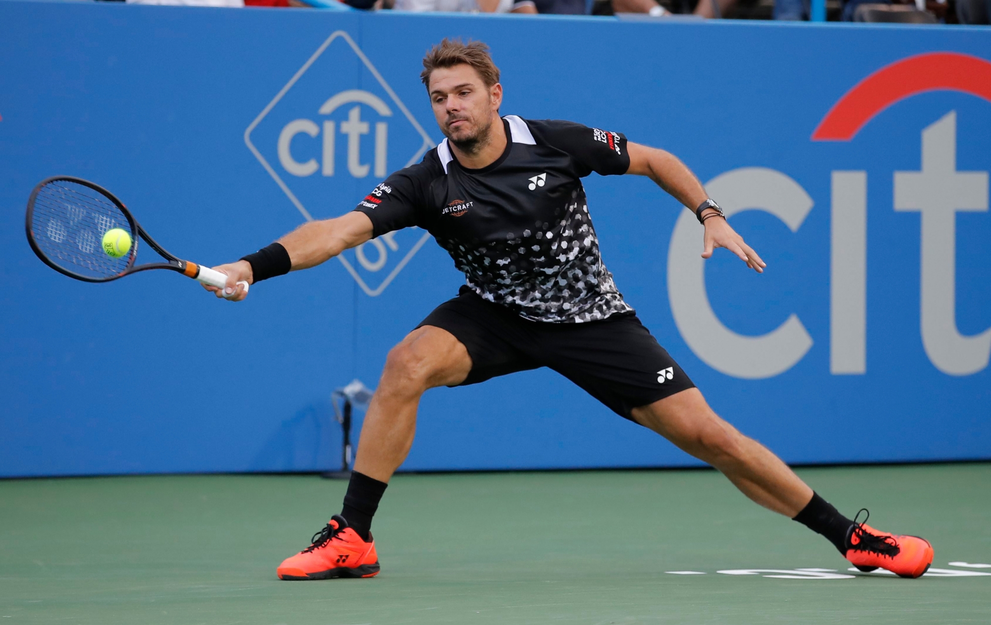 Stan Wawrinka of Switzerland returns against Donald Young during the first round of the Citi Open tennis tournament, Tuesday, July 31, 2018, in Washington. (AP Photo/Carolyn Kaster) Washington Tennis