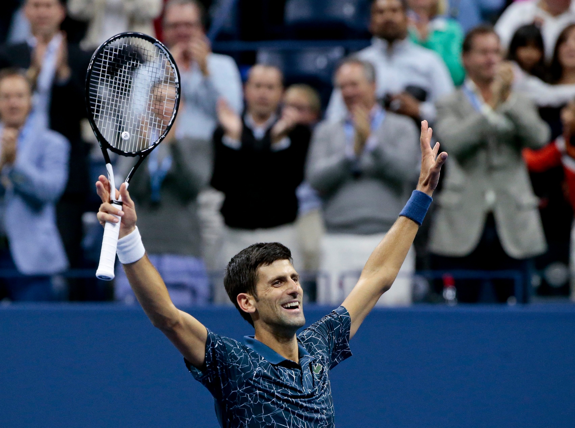 Novak Djokovic, of Serbia, celebrates after defeating gJuan Martin del Potro, of Argentina, during the men's final of the U.S. Open tennis tournament, Sunday, Sept. 9, 2018, in New York. (AP Photo/Andres Kudacki) US Open Tennis