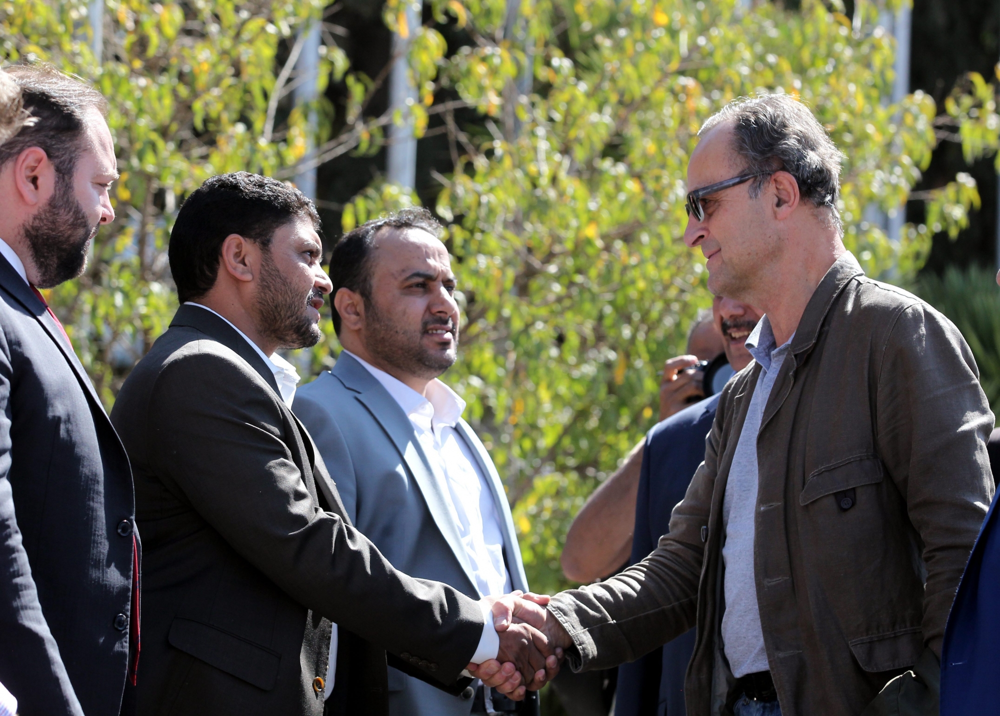 epa07246756 Retired Dutch General Patrick Cammaert (R), head of a UN truce team tasked with monitoring a ceasefire in the port city of Hodeidah, is greeted by Houthi representatives upon his arrival at SanaÄôa airport in SanaÄôa, Yemen, 23 December 2018. According to reports, the head of a UN truce team tasked with monitoring a ceasefire in YemenÄôs port city of Hodeidah, Retired Dutch General Patrick Cammaert, arrived in SanaÄôa before heading along with members of the team for Hodeidah to start the supervision of the ceasefire agreement between the Houthi rebels and YemenÄôs Saudi-backed government troops, ten days after it was signed by YemenÄôs two warring factions during UN-brokered peace talks held in Sweden.  EPA/YAHYA ARHAB YEMEN CONFLICT UN CEASEFIRE TEAM