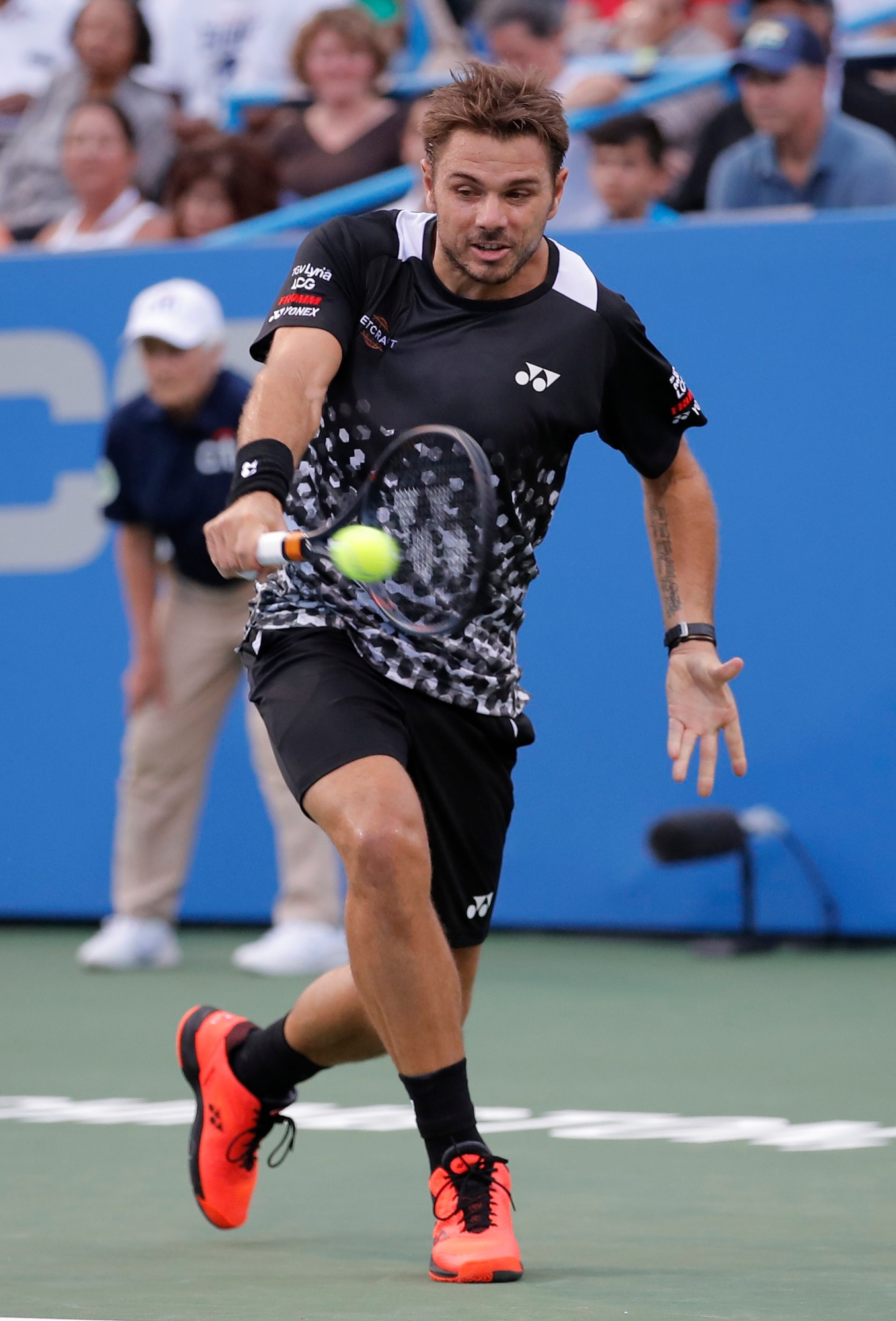 Stan Wawrinka, of Switzerland, returns to Donald Young, of the United States, during the Citi Open tennis tournament Tuesday, July 31, 2018, in Washington. Young won 6-4, 6-7 (5), 7-6 (3). (AP Photo/Carolyn Kaster) Washington Tennis